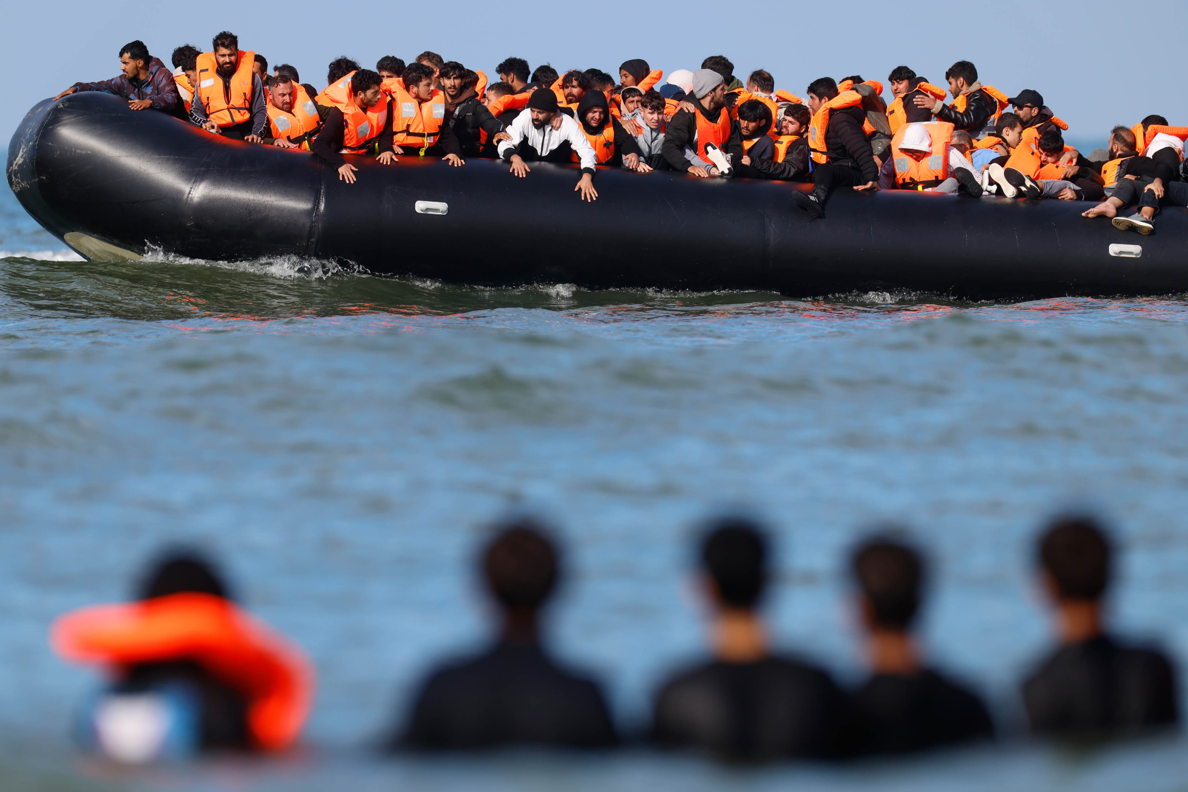 A group of migrants attempt to cross the English Channel in a dinghy off Hardelot, northern France, on Wednesday. Photo: AP