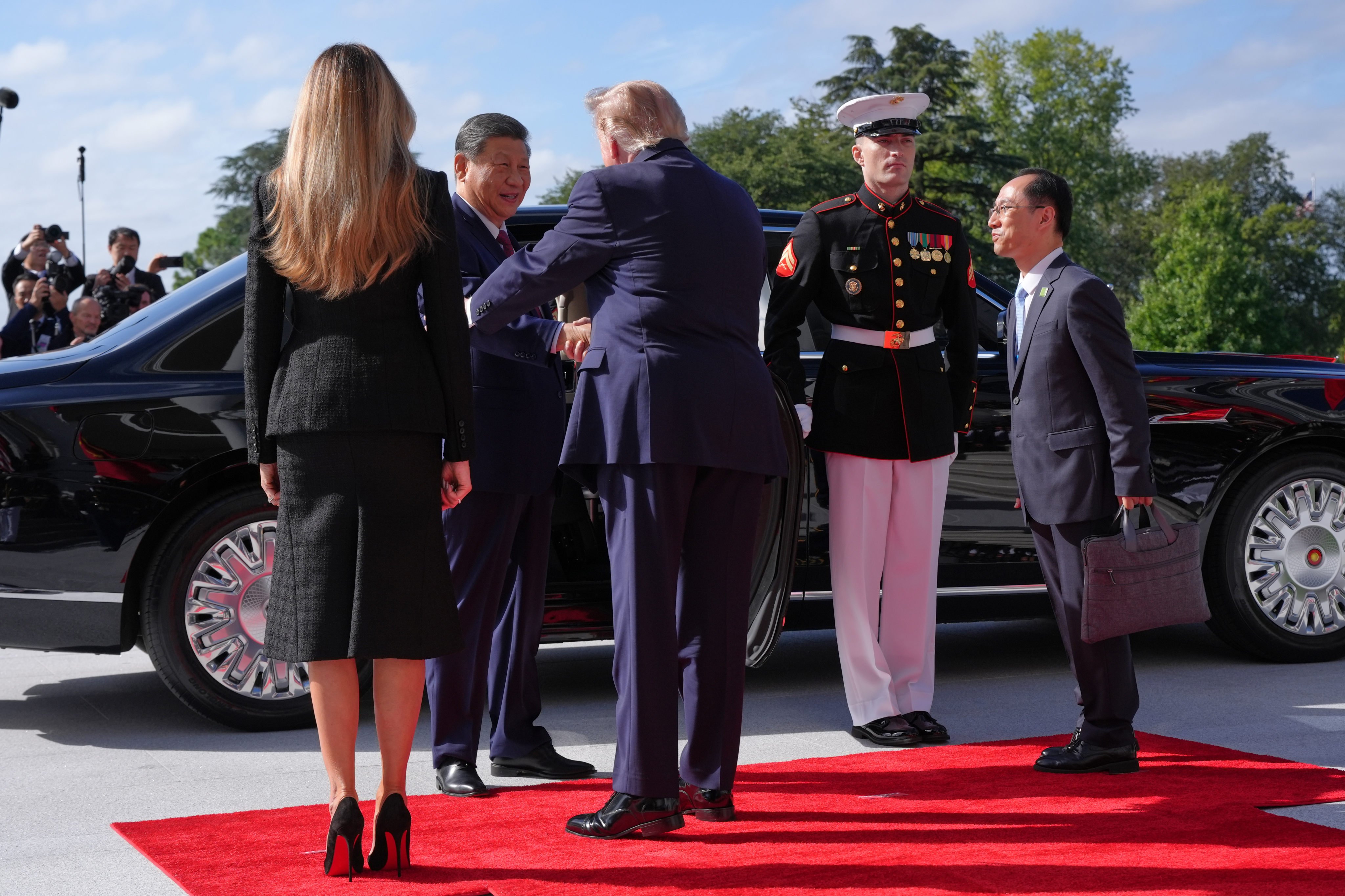 US President Donald Trump and China’s President Xi Jinping shake hands outside the White House on Thursday. Photo: AP