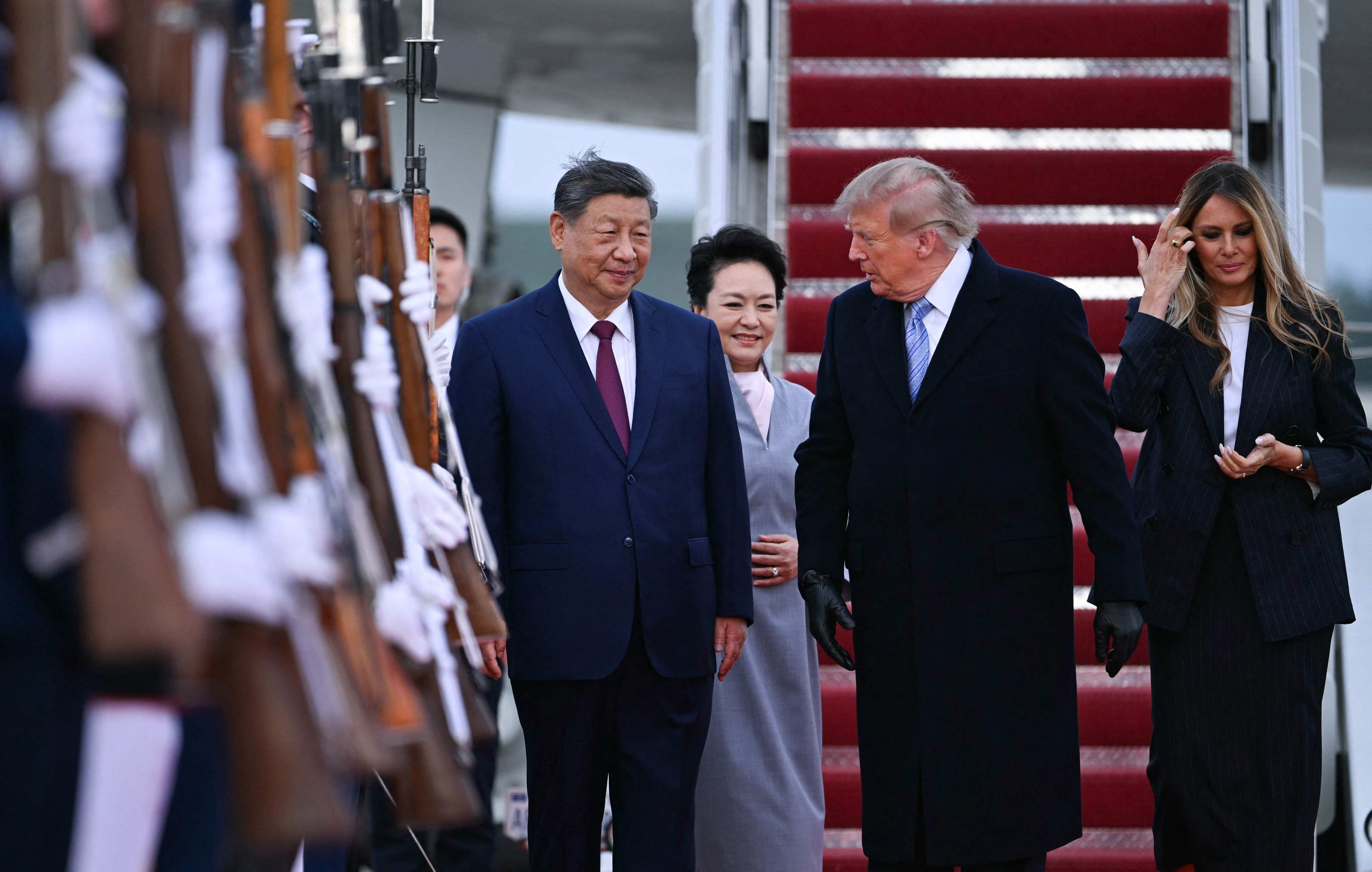 Trump and US first lady Melania Trump greet Xi and China’s first lady Peng Liyuan upon their arrival at Joint Base Andrews. Photo: AFP
