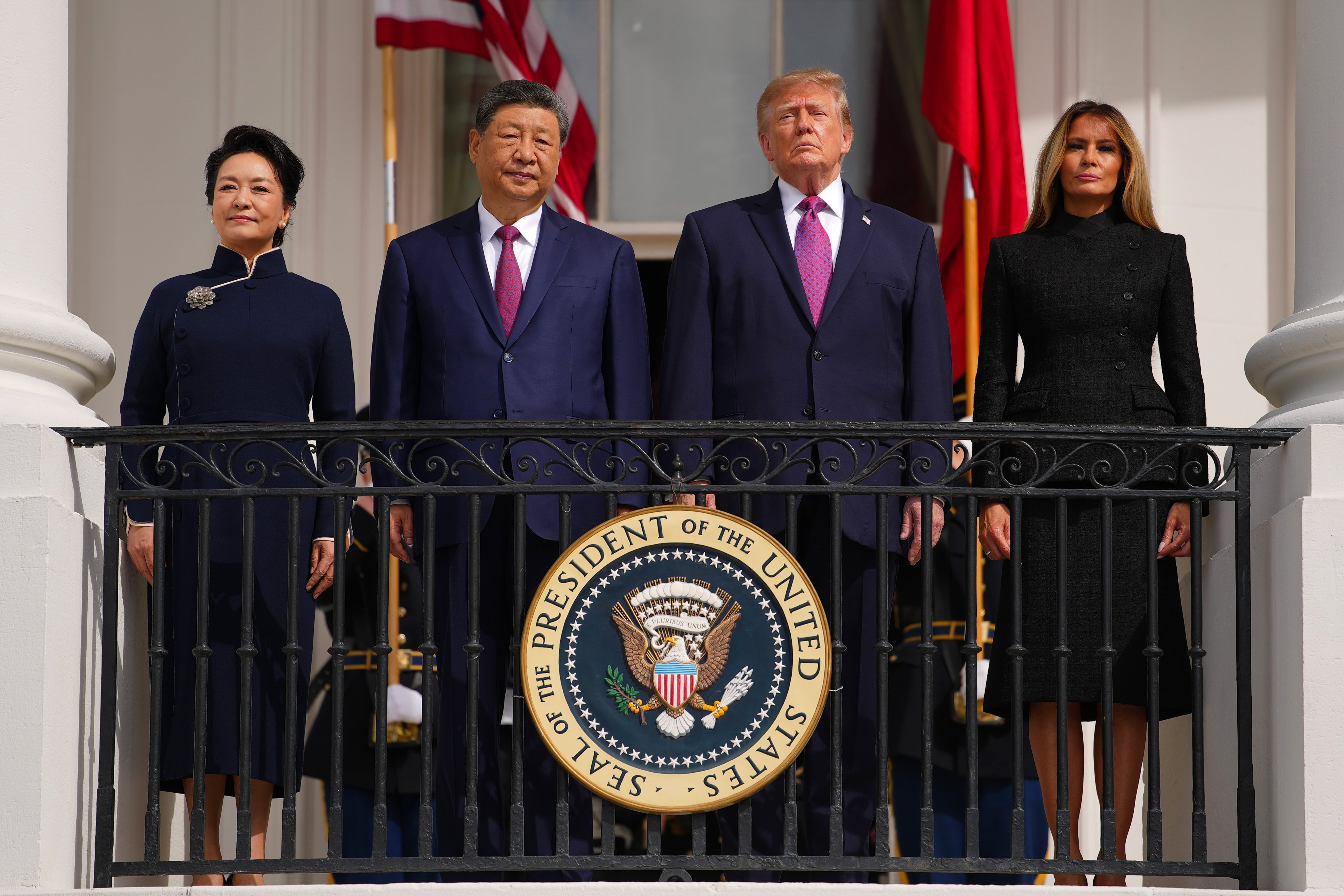 Left to right: China’s first lady Peng Liyuan, China’s President Xi Jinping, US President Donald Trump and US first lady Melania Trump look on from the South Portico  of the White House during a Silent Drill Platoon Review on Thursday, as Trump welcomes Xi to the White House. Photo: Getty Images
