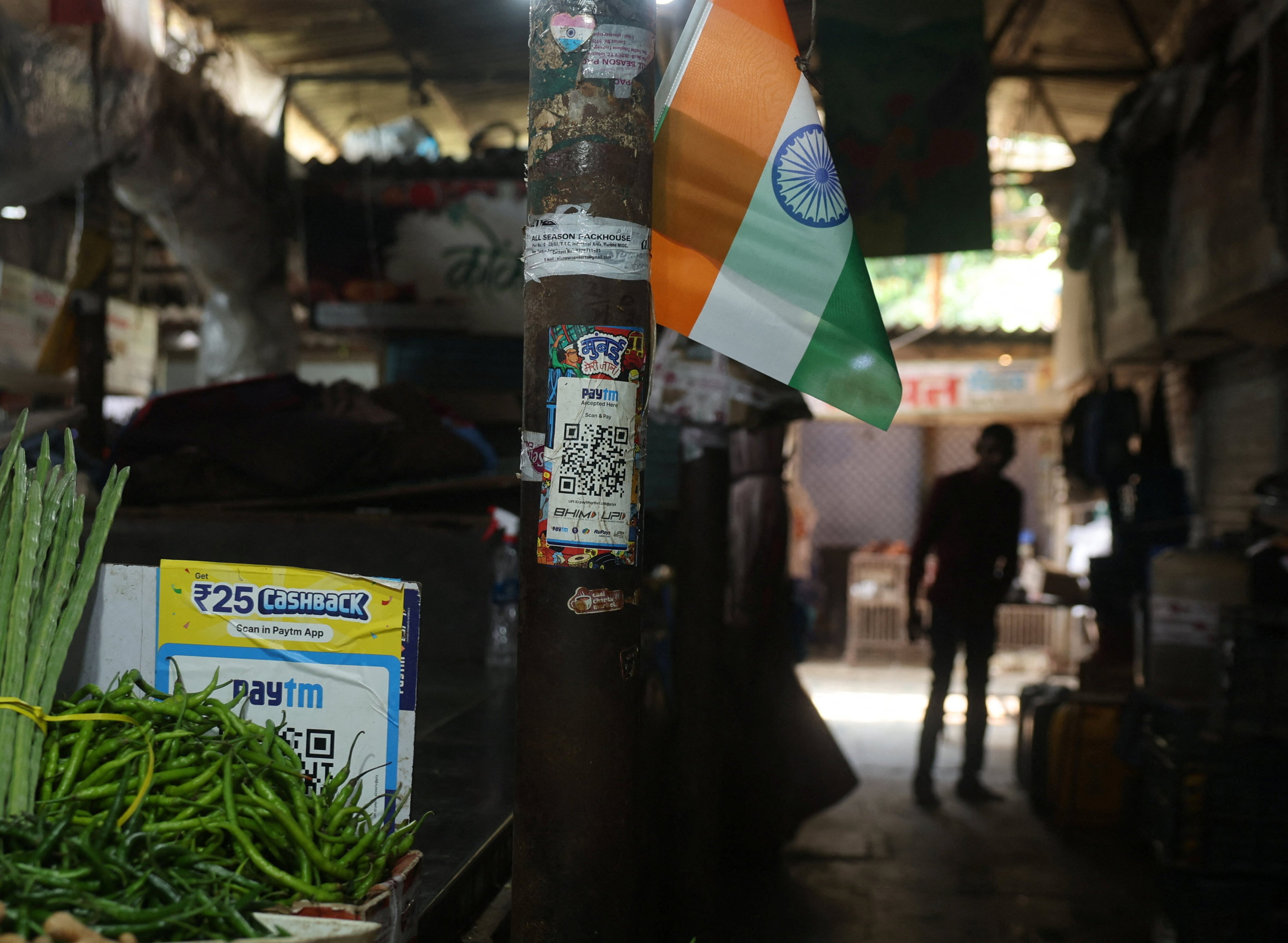 Paytm payment QR codes are displayed at a vegetable shop in Mumbai, India, on Sunday. Photo: Reuters
