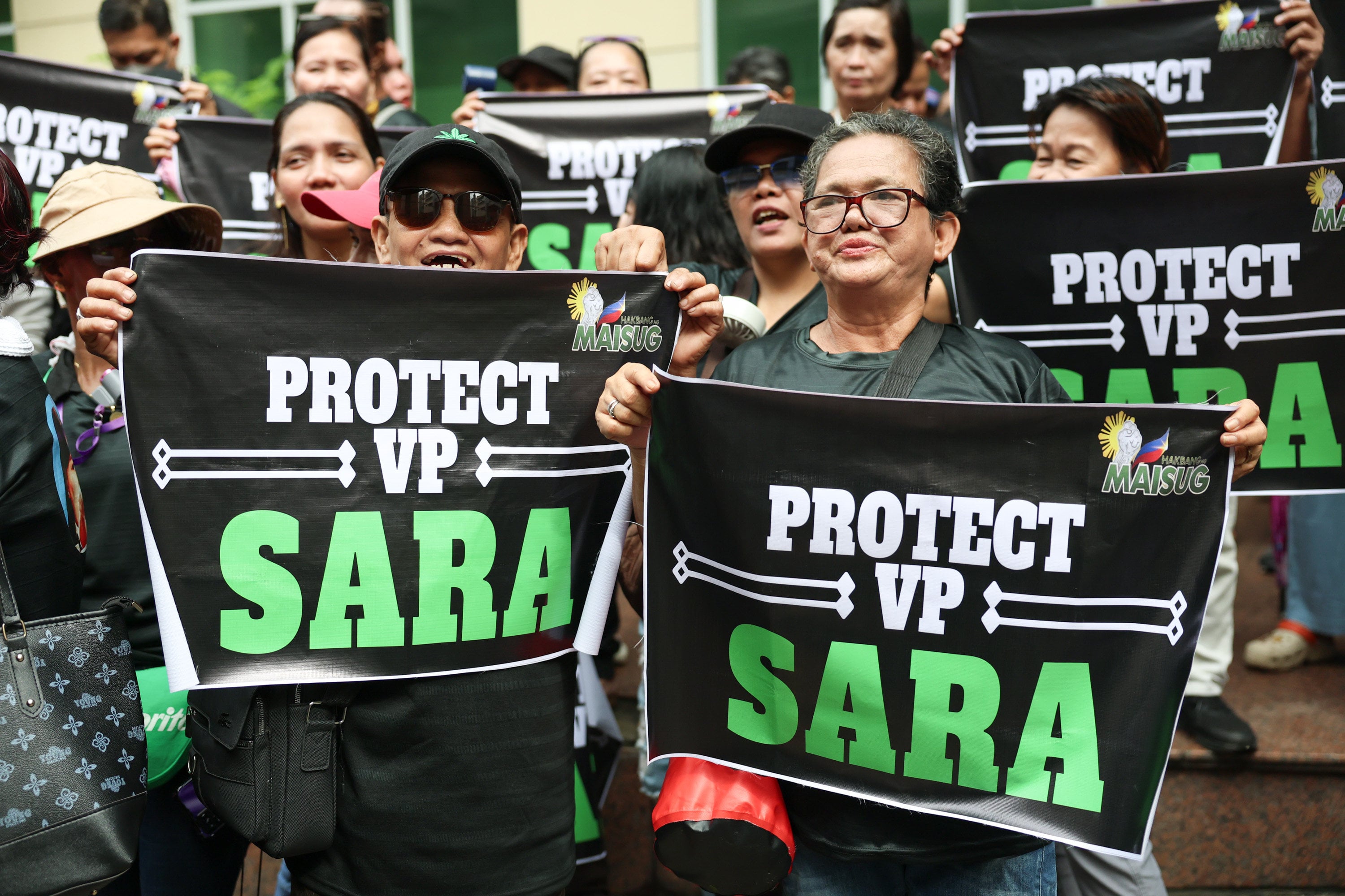 Supporters of Philippine Vice-President Sara Duterte-Carpio gather as she visits the Quezon city justice hall in Quezon City in September. Photo: AP