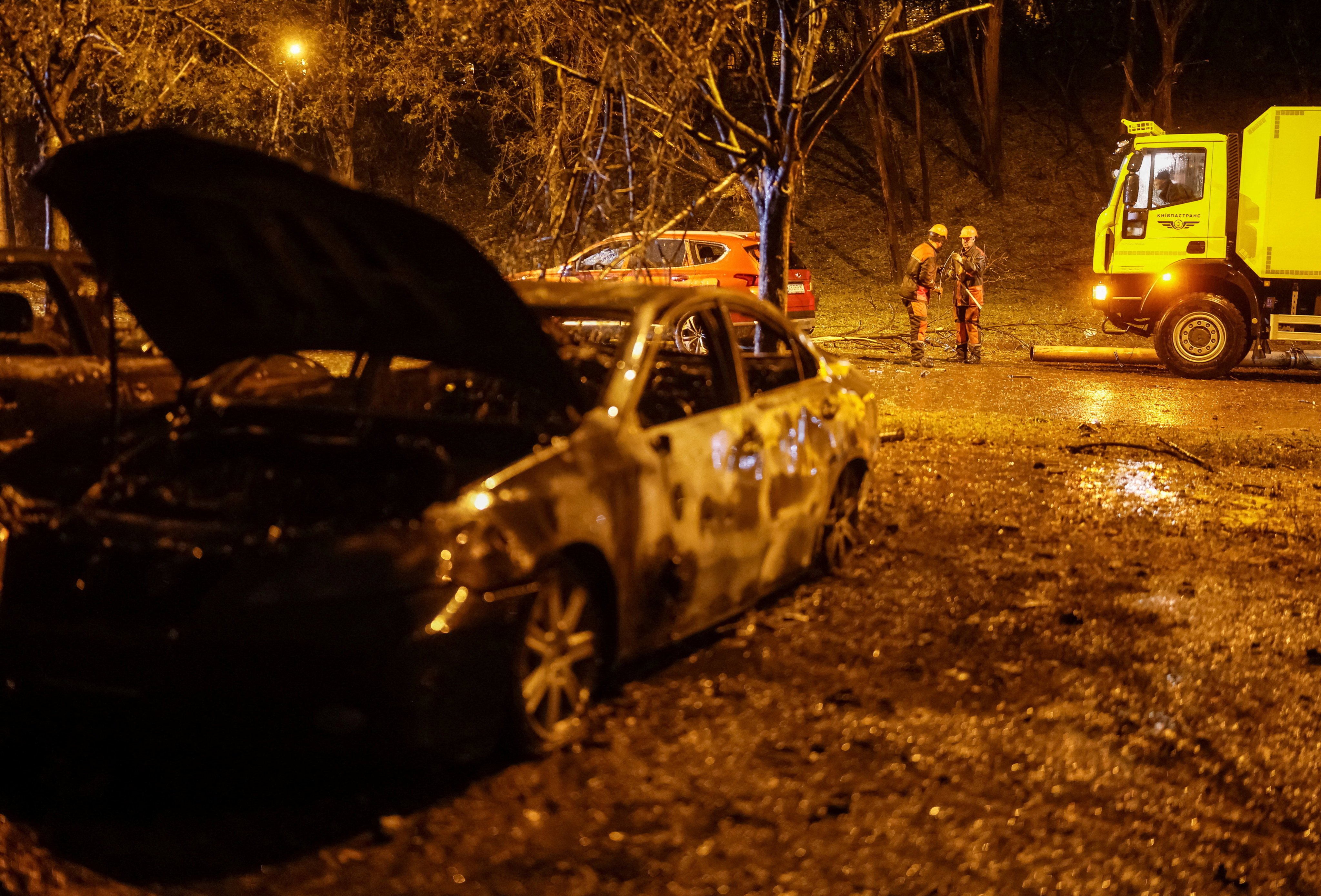 Municipal workers at the site of a Russian missile strike near a maternity hospital in Kyiv, Ukraine, on Thursday. Photo: Reuters