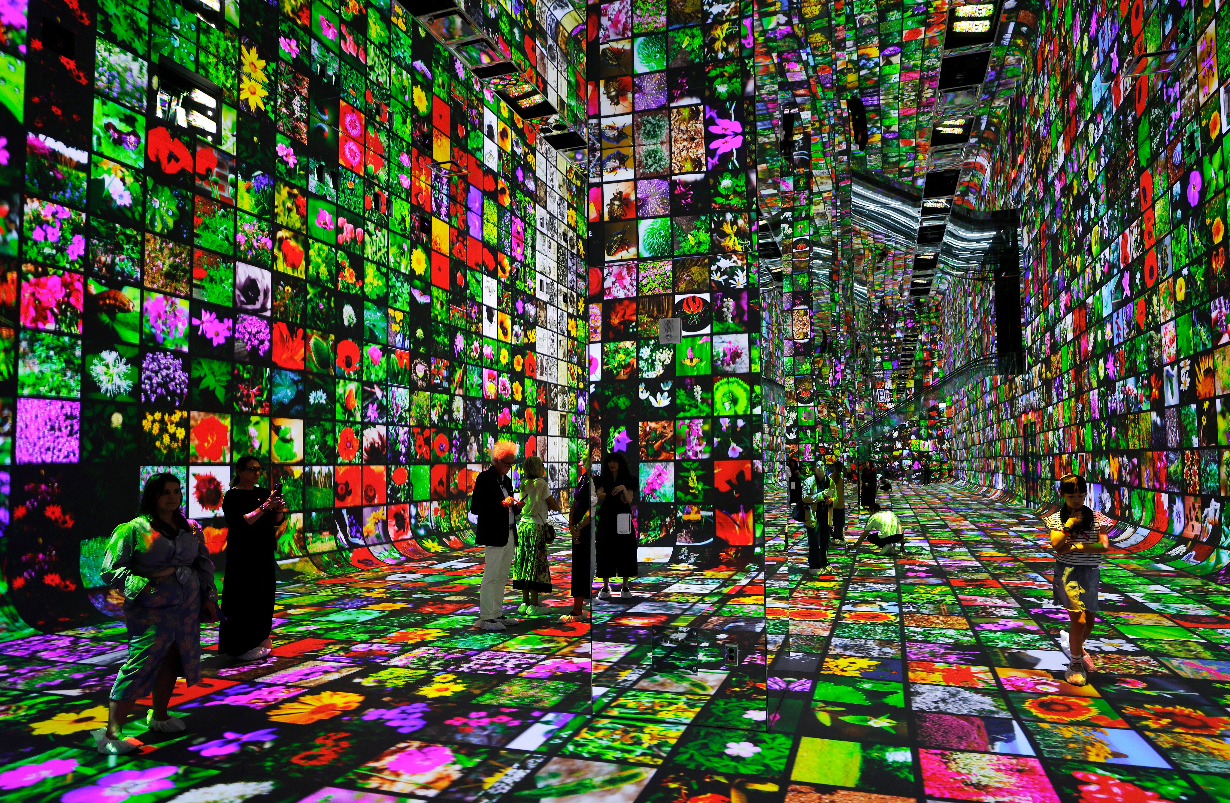 Visitors tour Dataland, the world’s first museum of AI arts, on June 16 in Los Angeles. Photo: Getty Images