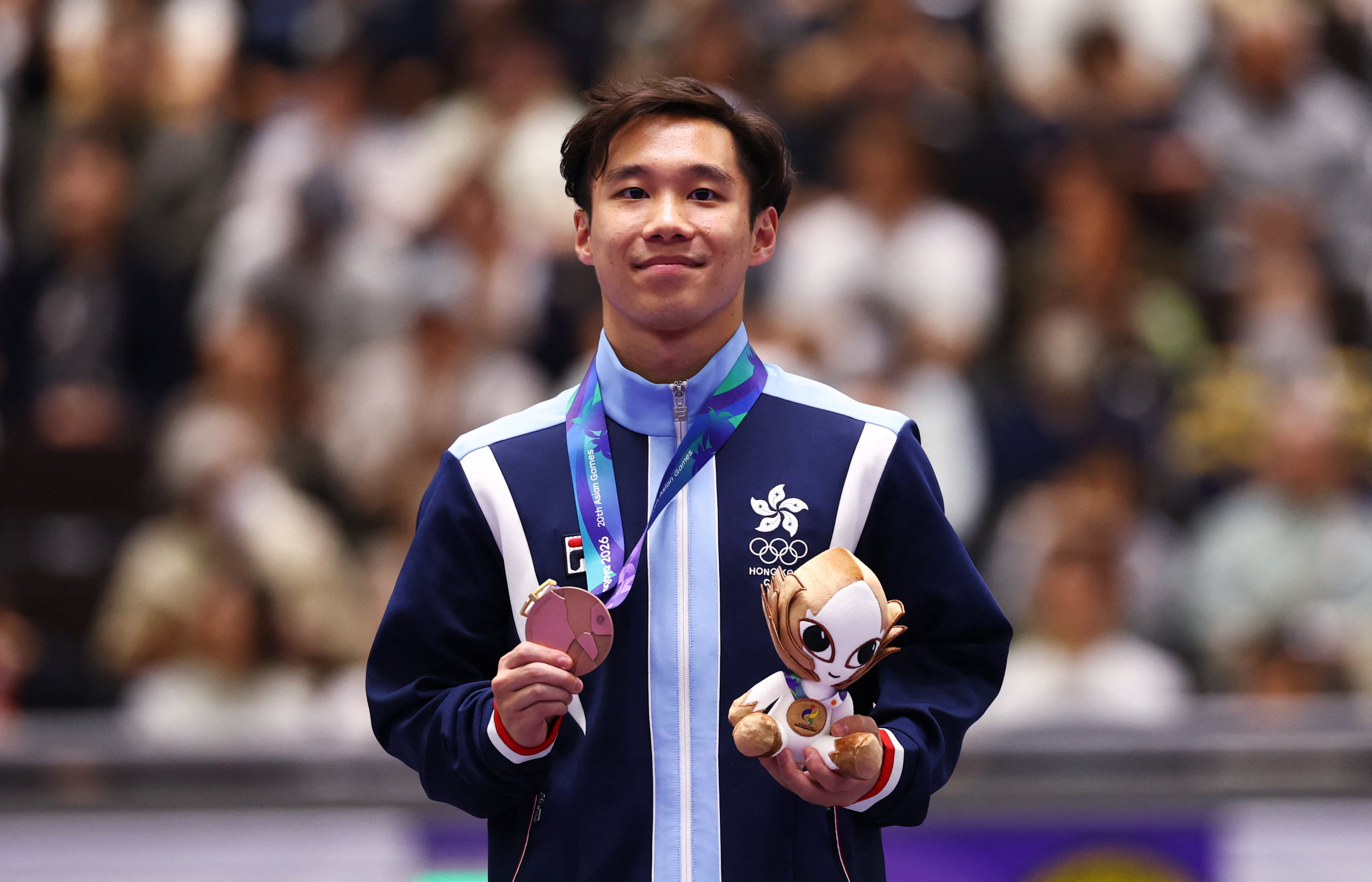 Hong Kong’s Ng Ka-ki won the Asian Games bronze medal in the vault final on Friday. Photo: Reuters