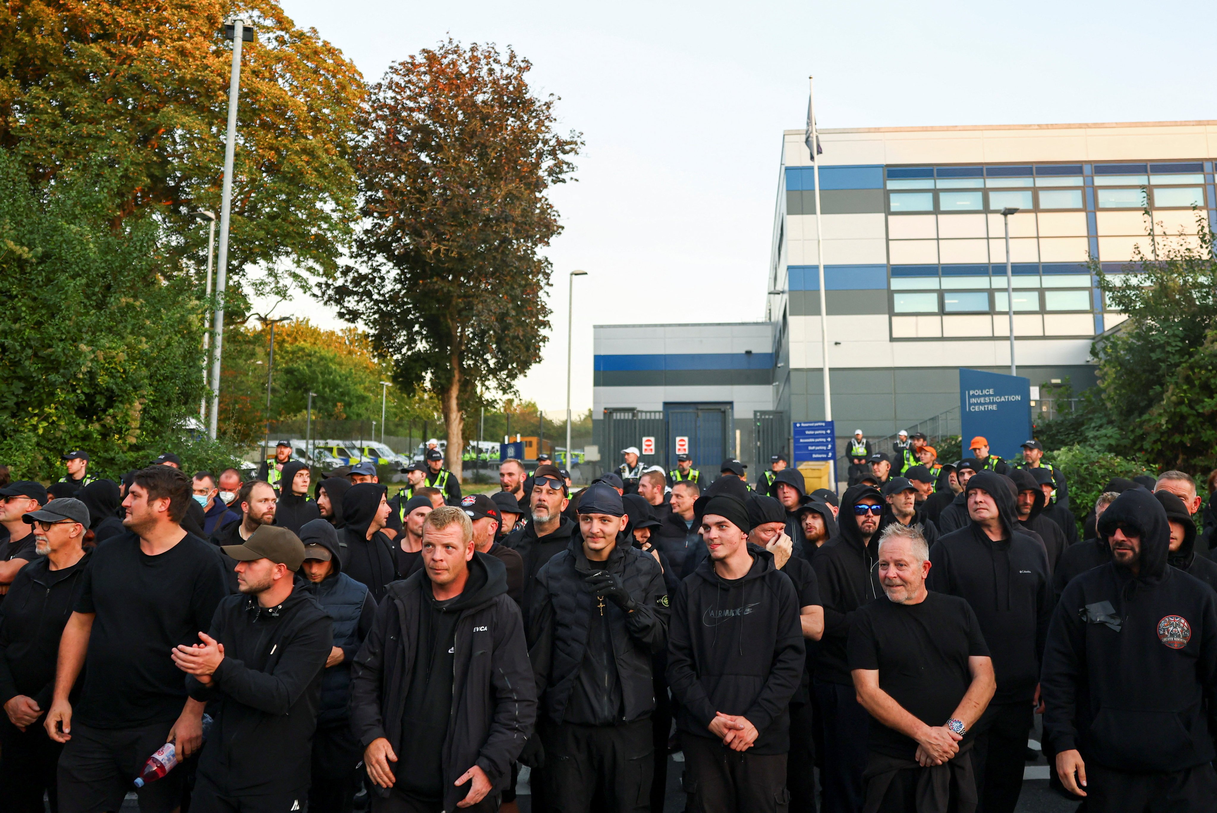 Protesters gather in support of arrested activist Daniel Thomas, also known as Danny Tommo, founder of the Patriot Platform nationalist protest network, outside Basingstoke Police Investigation Centre in Basingstoke, Britain on Thursday. Photo: Reuters