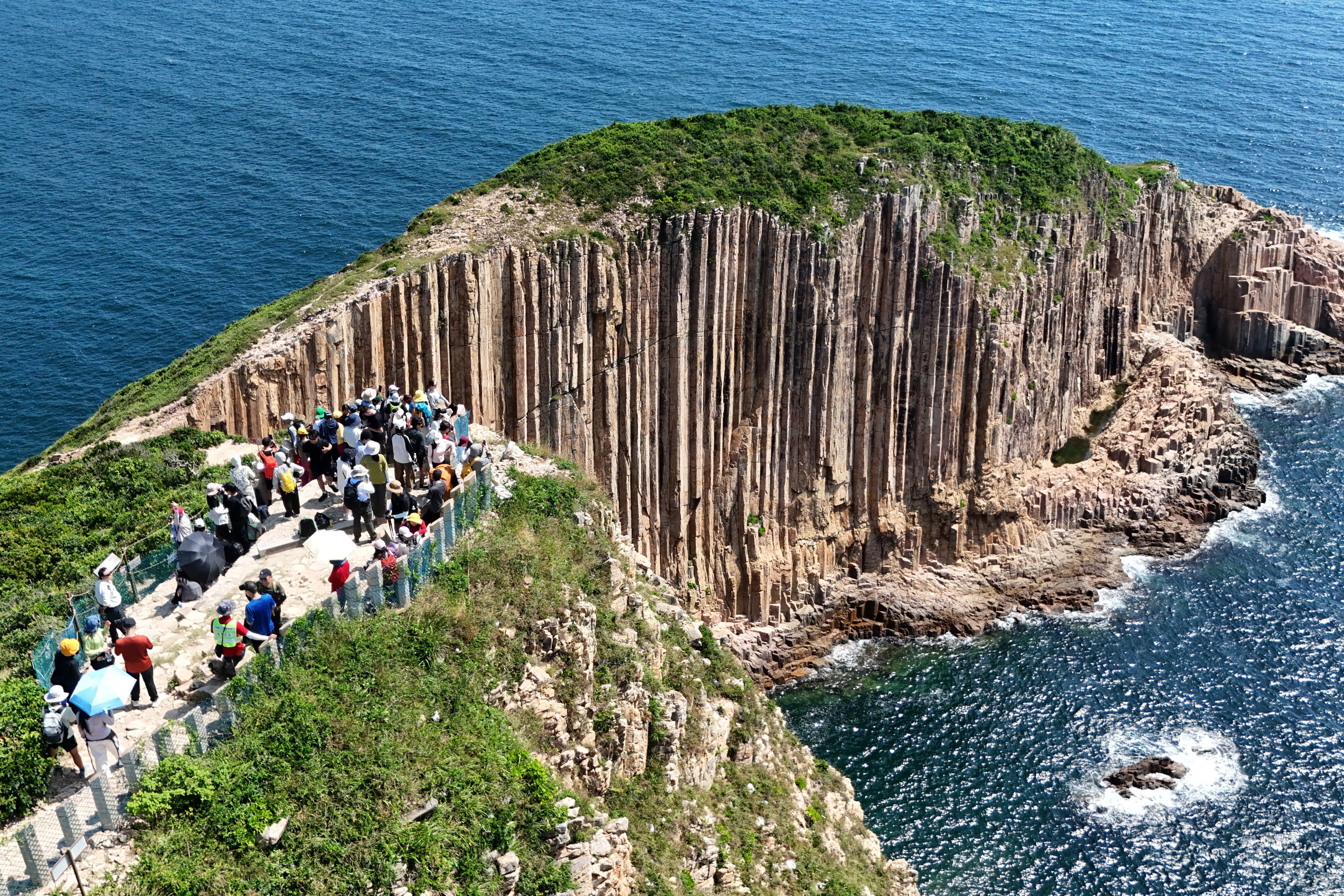 Tourists at the High Island Reservoir East Dam — the starting point for visiting Po Pin Chau — during the Mid-Autumn Festival holiday on Friday. Photo: Edmond So
