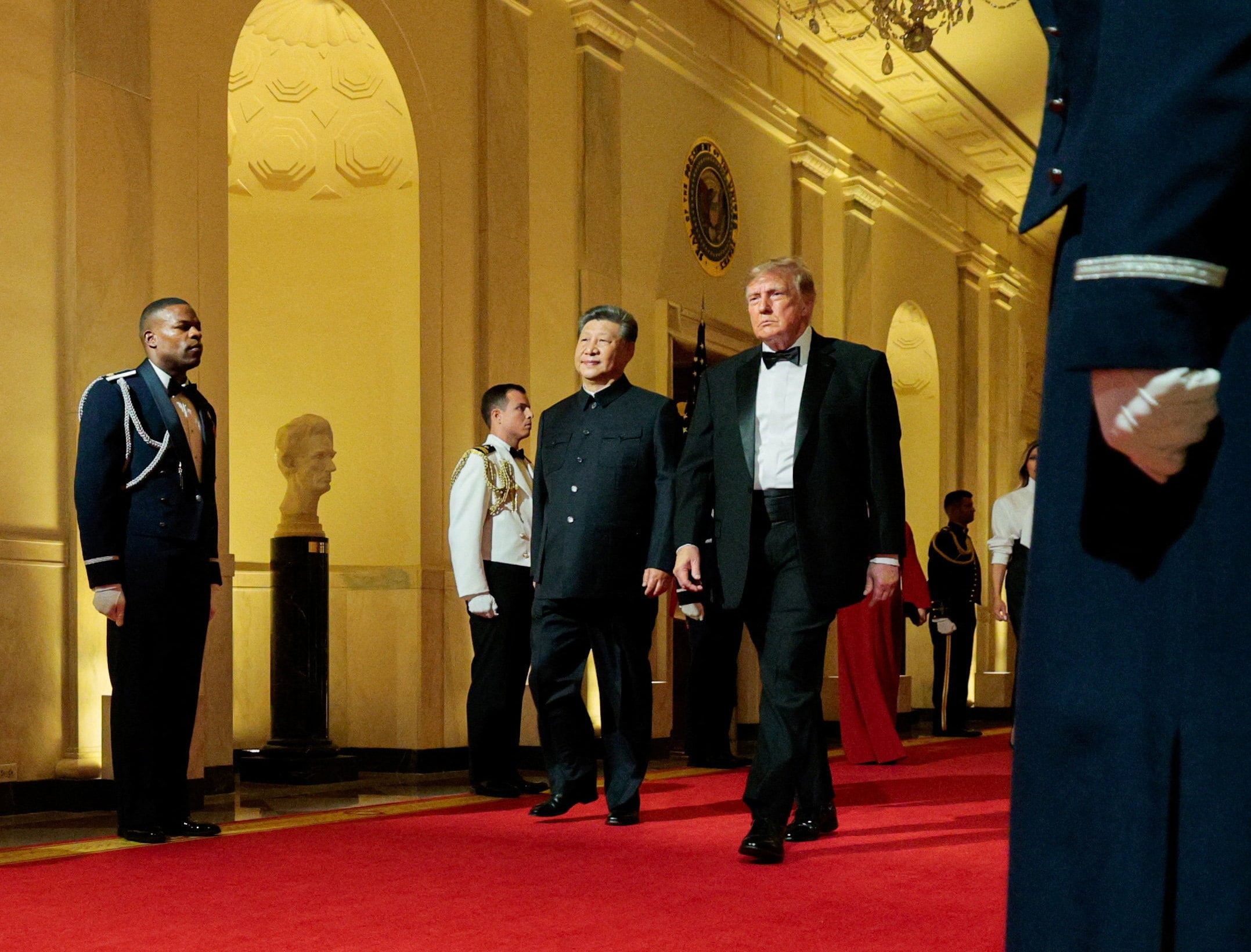 Chinese President Xi Jinping and US President Donald Trump arrive for a White House state dinner. Photo: Reuters