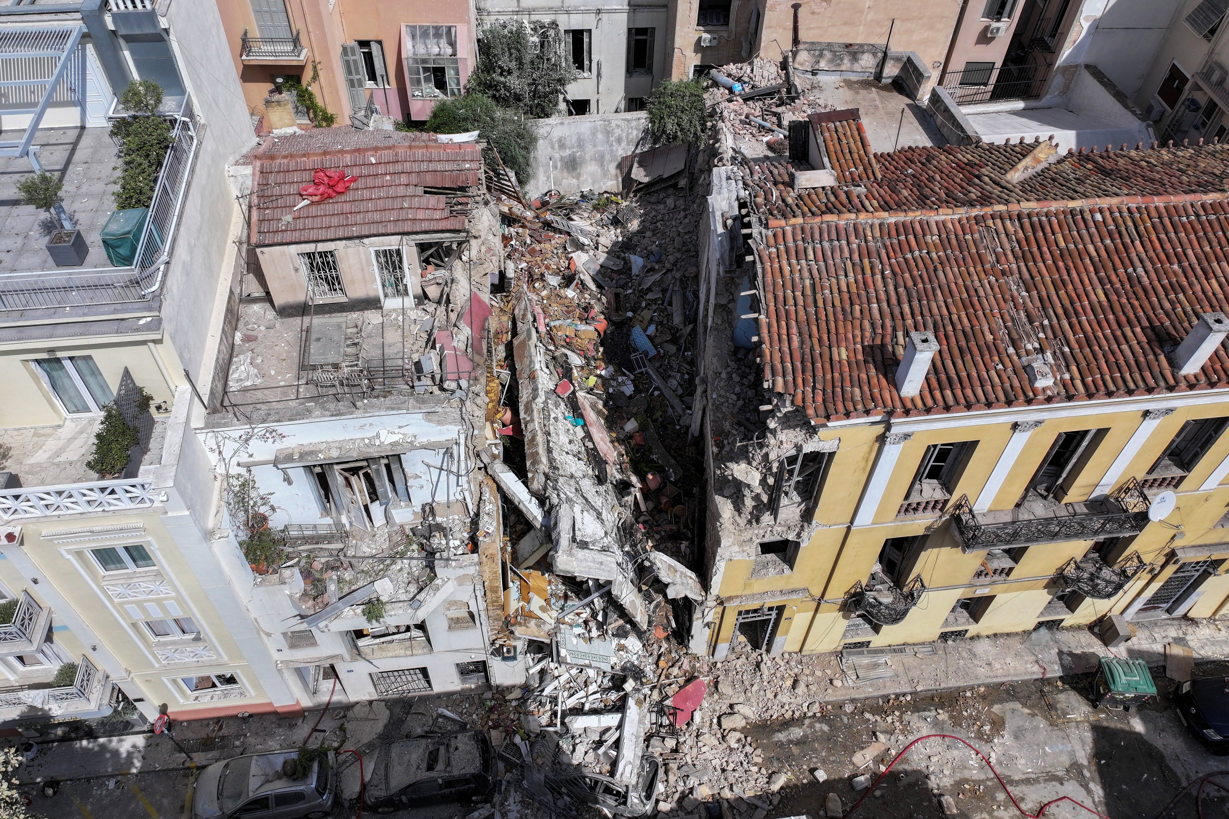 A partially collapsed building is seen after an explosion in a popular tourist area of Athens on Friday. Photo: Reuters