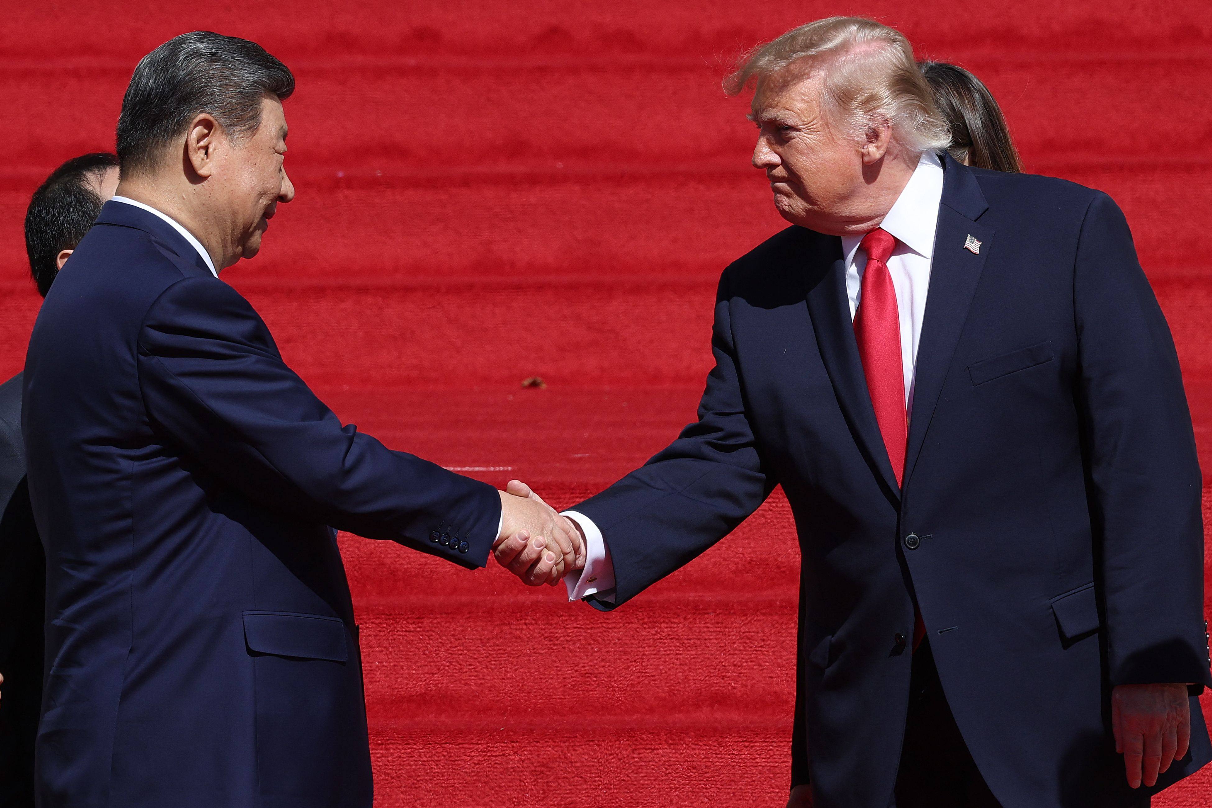 Chinese leader Xi Jinping and US President Donald Trump shake hands as they part ways in front of the National Archives Museum in Washington on Friday. Photo: Getty Images via AFP