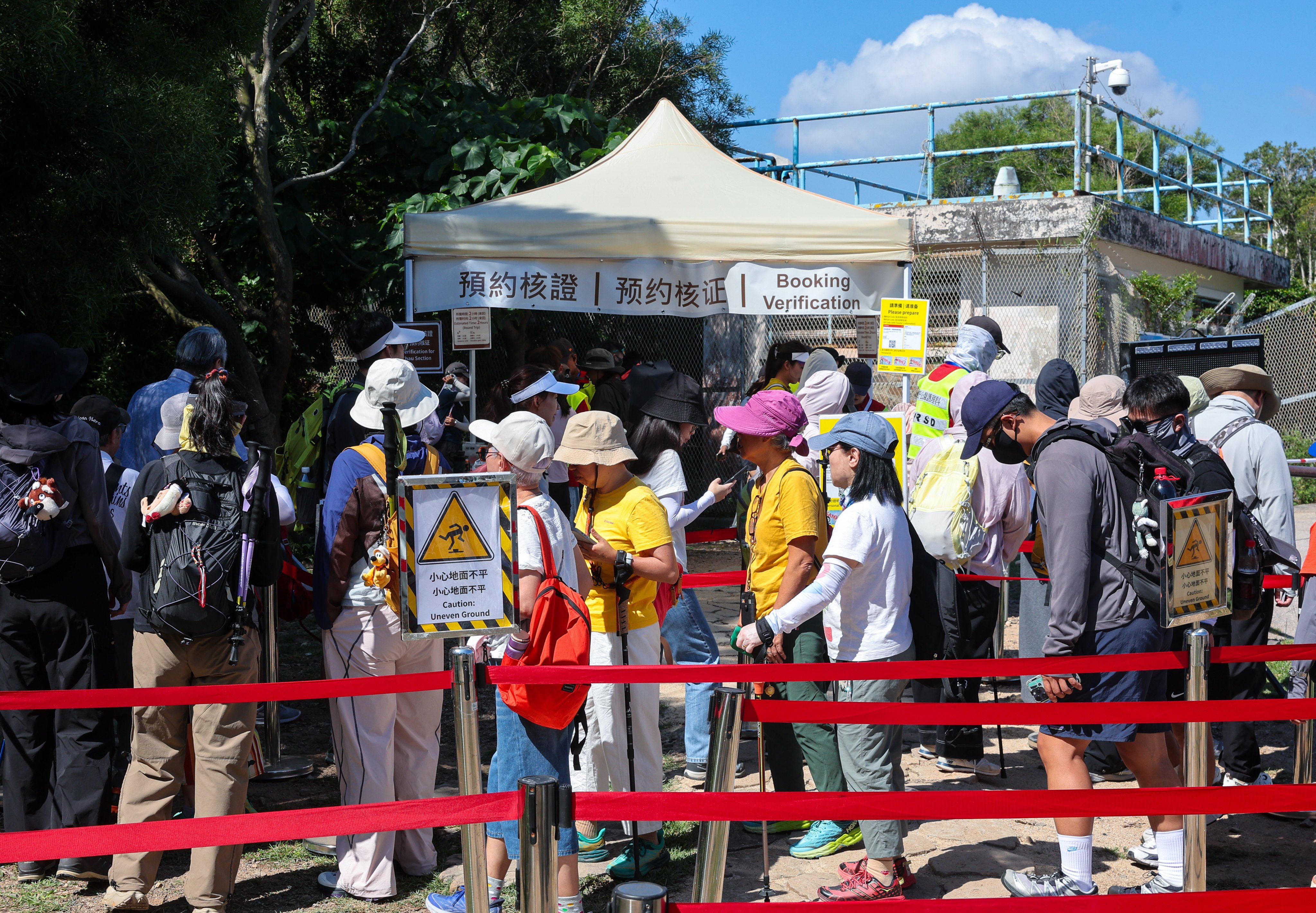 Visitors wait to use Po Pin Chau’s booking system on Saturday. Photo: Edmond So