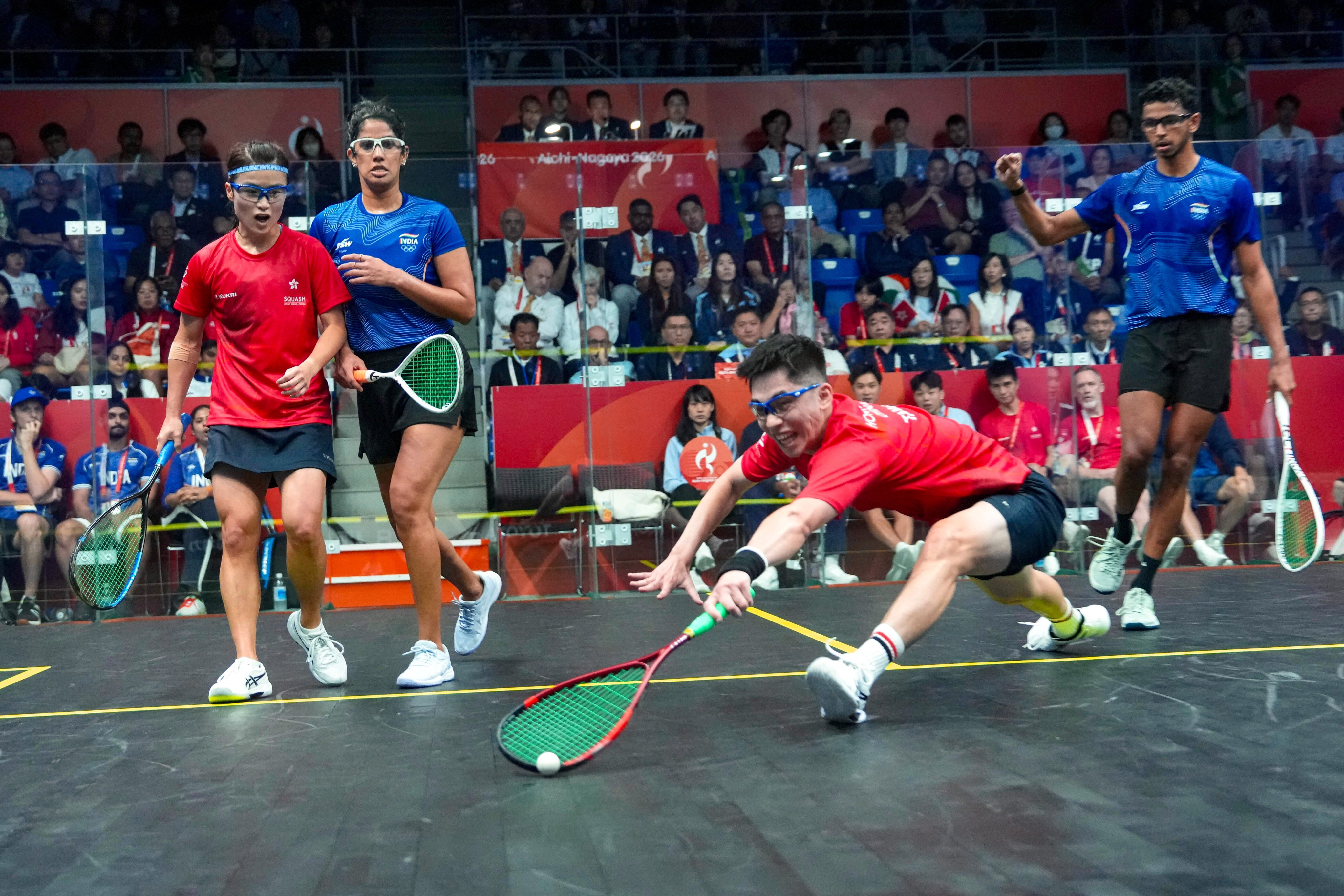 Hong Kong’s Lee Ka-yi (in red, left) and Tang Ming-hong won their semi-final against India’s Joshna Chinappa (in blue, left) and Velavan Senthilkumar on Saturday. Photo: Sam Tsang