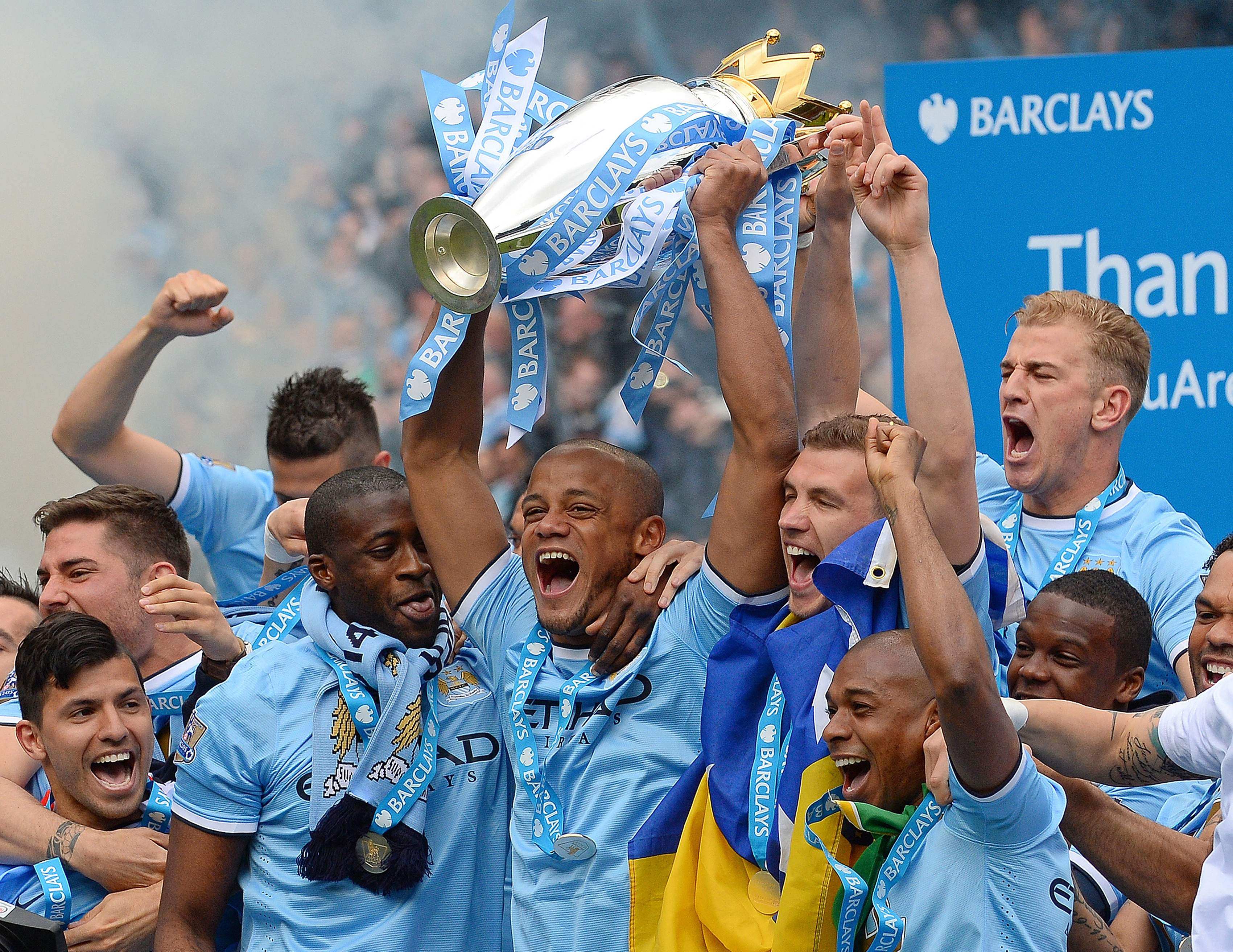 Manchester City captain Vincent Kompany hoists the Premiership trophy after his team finished top of the league in 2014, one of three titles won during the period in question. Photo: AFP