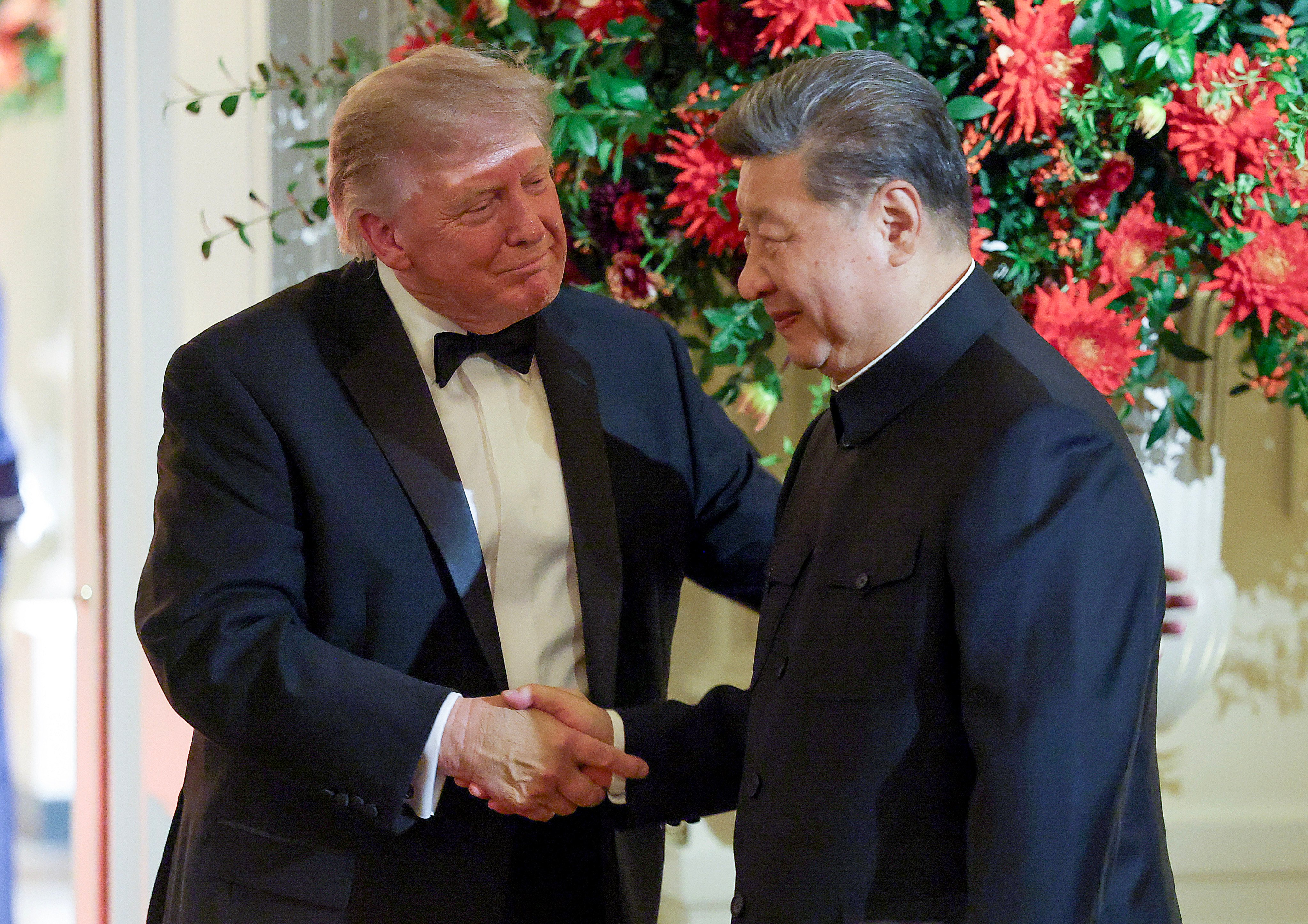 US President Donald Trump welcomes Chinese President Xi Jinping to a state dinner in the East Room of the White House on Thursday in Washington. Photo: Getty Images