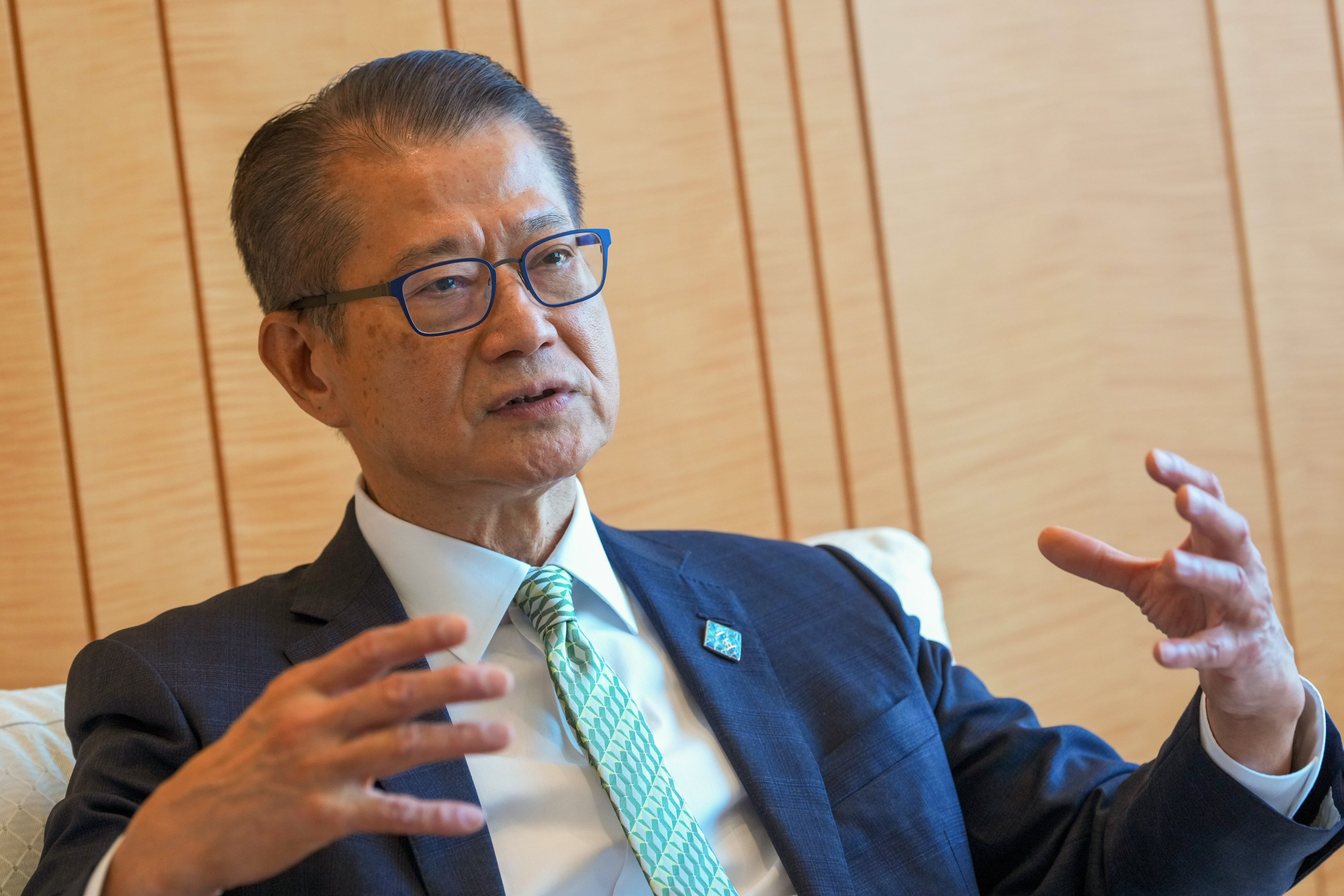 Financial Secretary Paul Chan says he remains “cautiously optimistic” about export growth. Photo: Dickson Lee