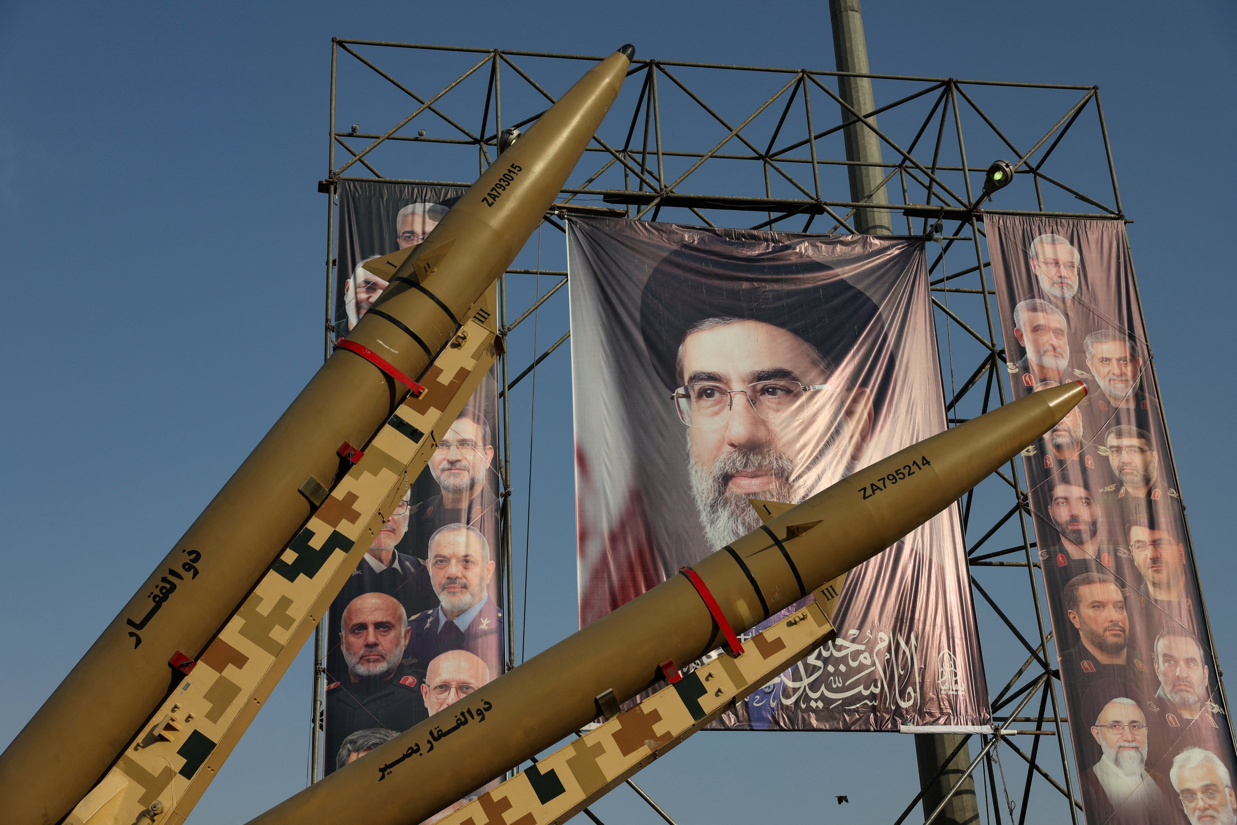 Missiles displayed next to a banner featuring Iran's supreme leader Mojtaba Khamenei in Tehran. Photo: West Asia News Agency via Reuters