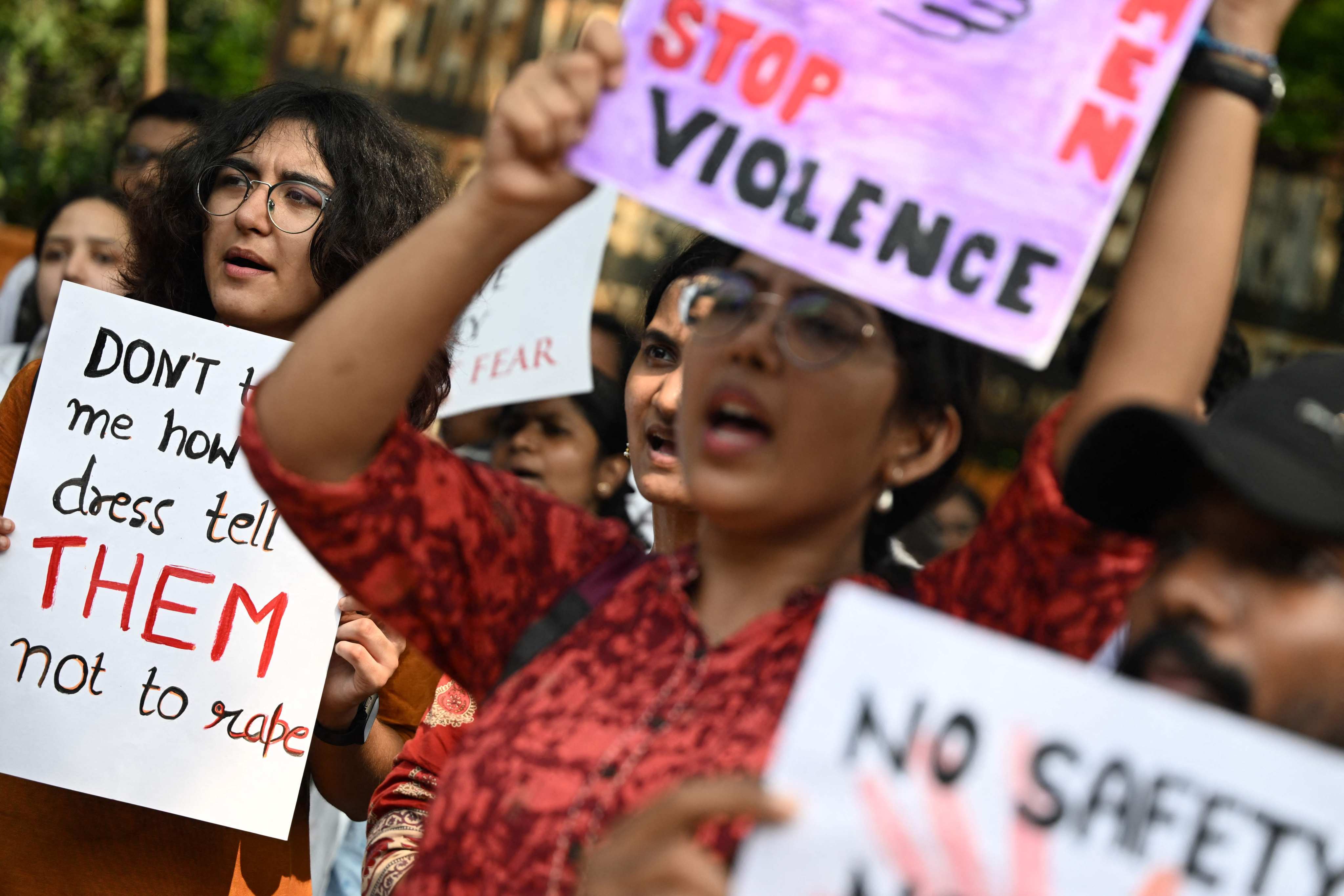 Medical professionals and students hold placards during a protest in New Delhi in 2024 against the rape and murder of a doctor in West Bengal. Legal reforms and tougher punishments have failed to curb sexual violence. Photo: AFP