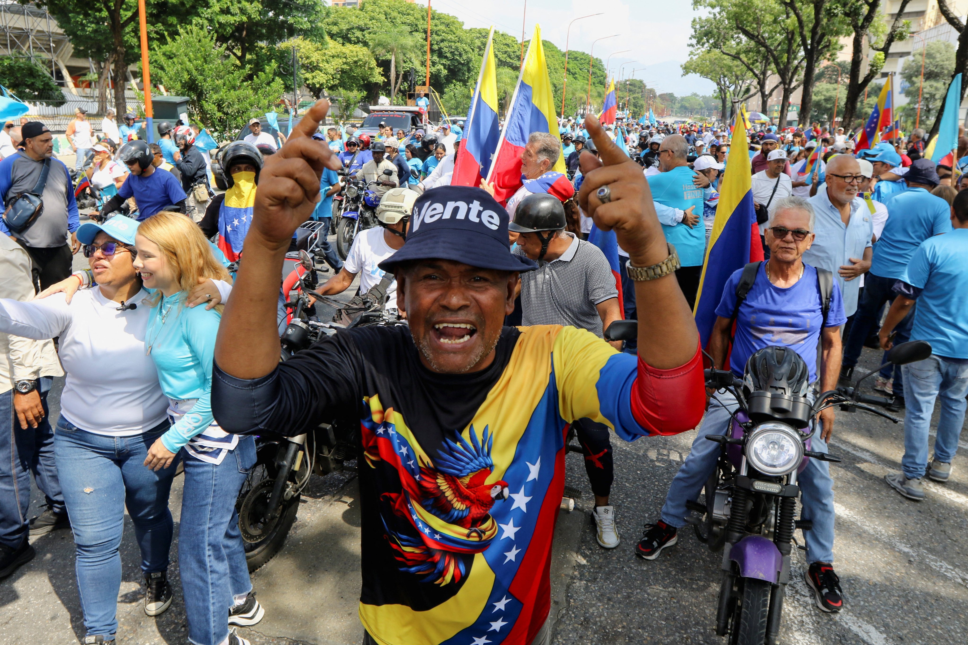 Demonstrators take part in a rally in support of Venezuelan opposition leader Maria Corina Machado, calling for her safe return to the country, an electoral timetable and presidential elections in 2027, during a nationwide day of protests, in Valencia, Venezuela on Sunday. Photo: Reuters
