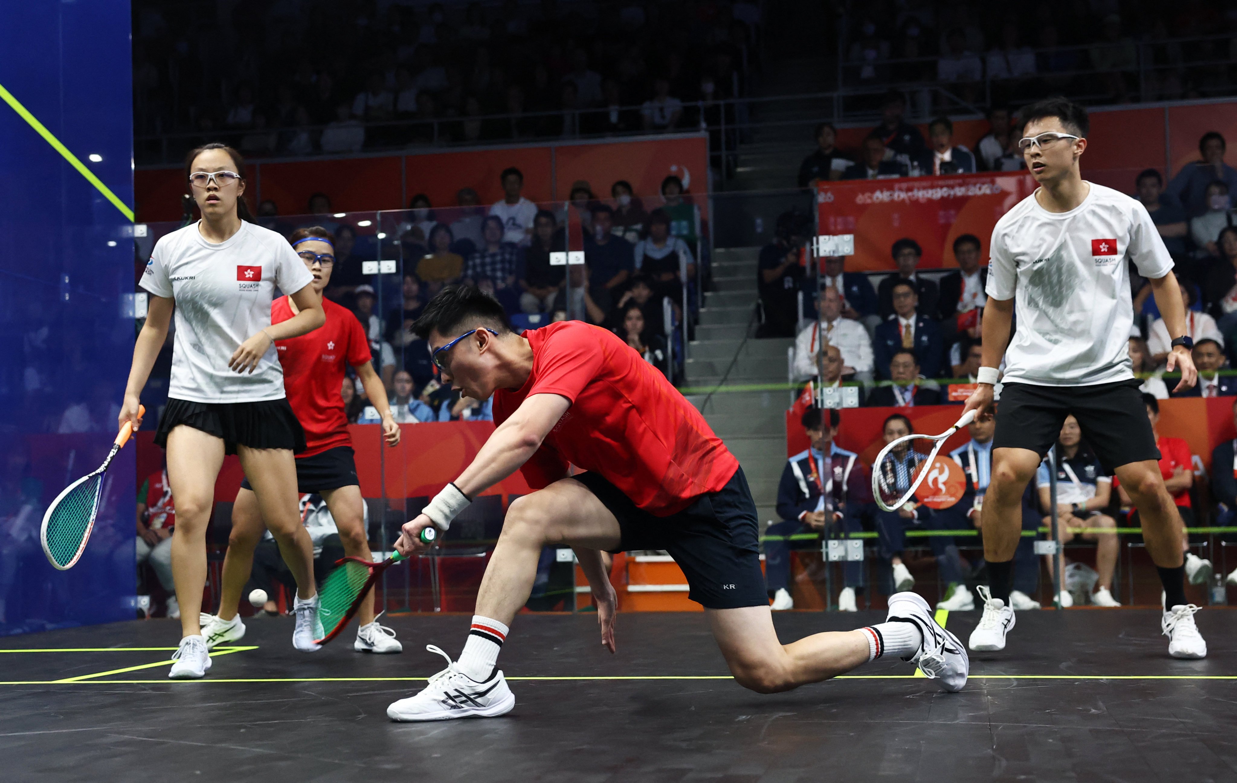 Hong Kong’s Toby Tse (left, white) and Lai Cheuk-nam in the mixed doubles final against winners Lee Ka-yi and Tang Ming-hong. Photo: Reuters