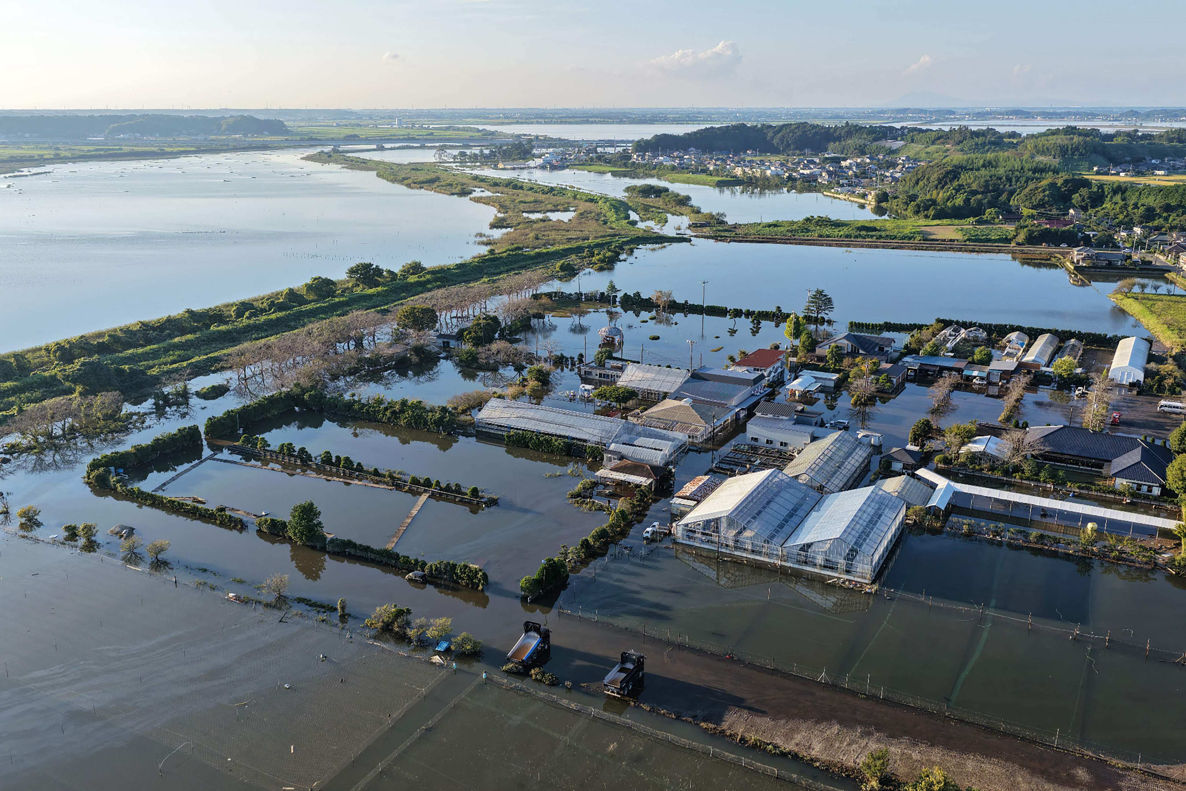 An area around Lake Imbanuma remains flooded after a levee collapsed due to heavy rain from Typhoon Dujuan in Narita, Chiba prefecture on Thursday. Photo: Jiji Press / AFP
