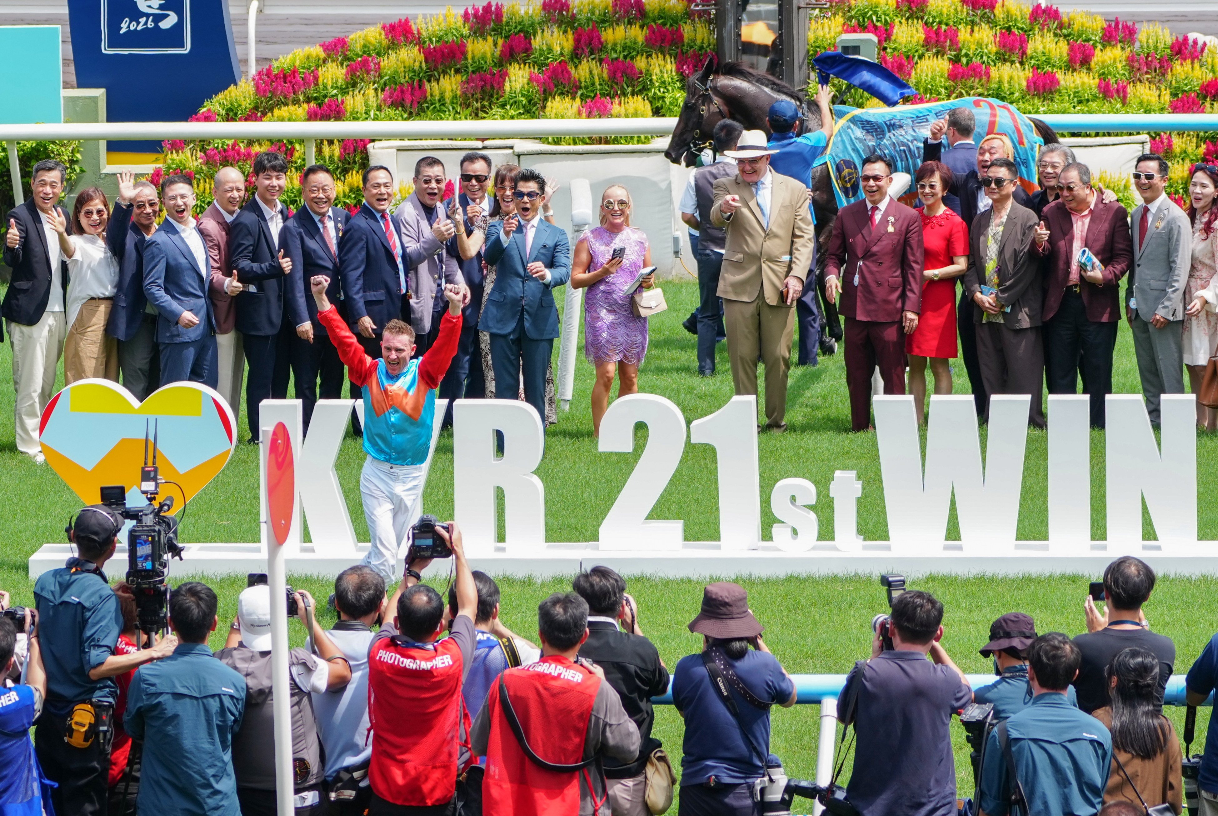 Jockey Zac Purton celebrates Ka Ying Rising’s 21st straight win. Photo: Sam Tsang