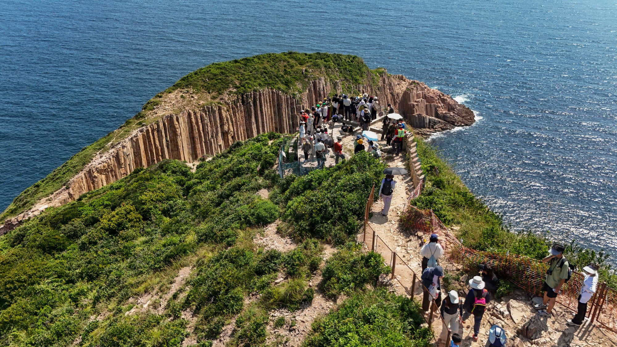 Tourists gather at a viewing platform on Po Pin Chau. Photo: Edmond So Tourists gather at a viewing platform on Po Pin Chau. Photo: Edmond So