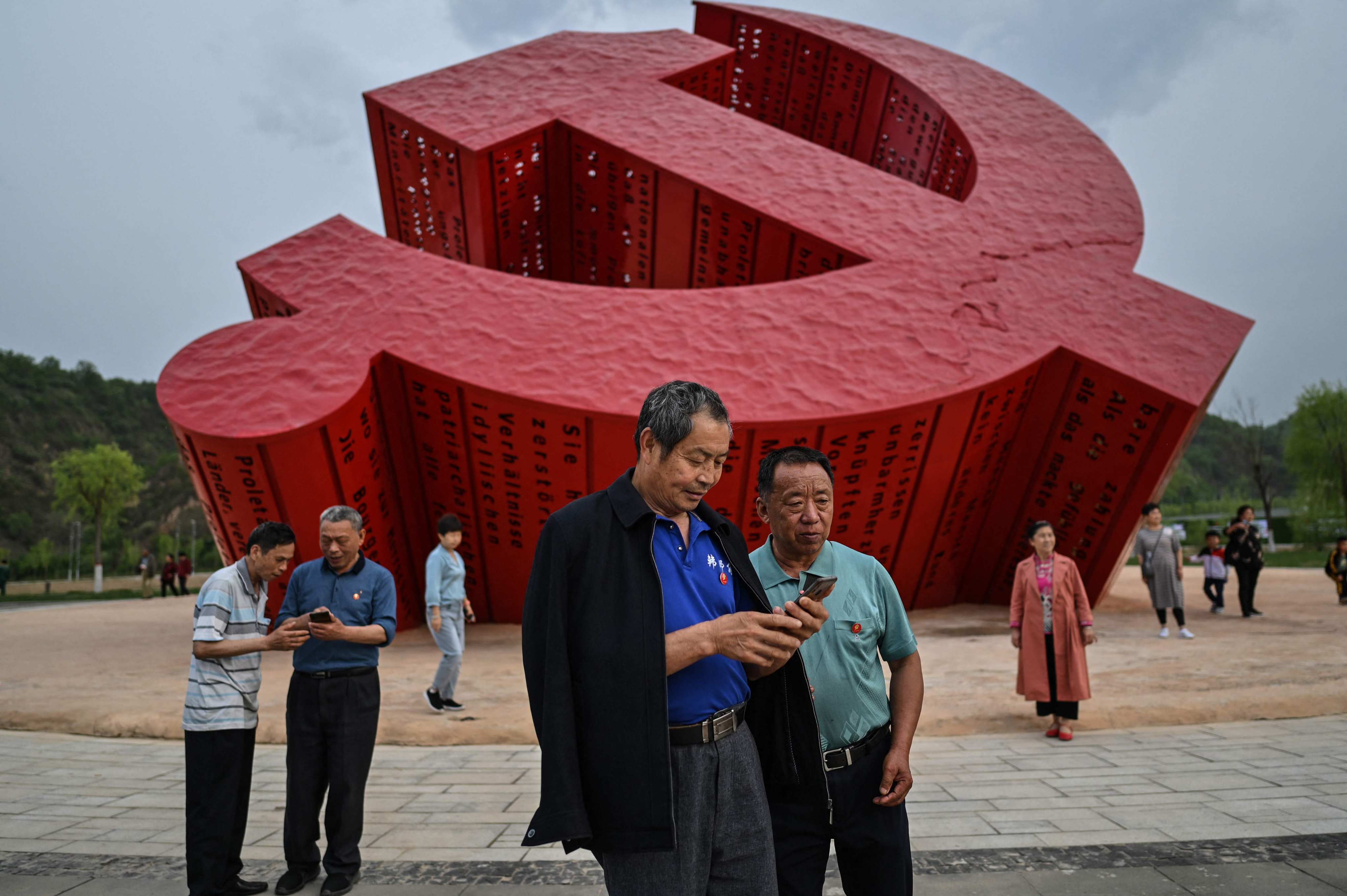 A media tour at a monument of the hammer and sickle, in Nanniwan, in Shaanxi province, some 60km (37 miles) from Yanan, the headquarters of the Chinese Communist Party from 1936 to 1947. Photo: AFP