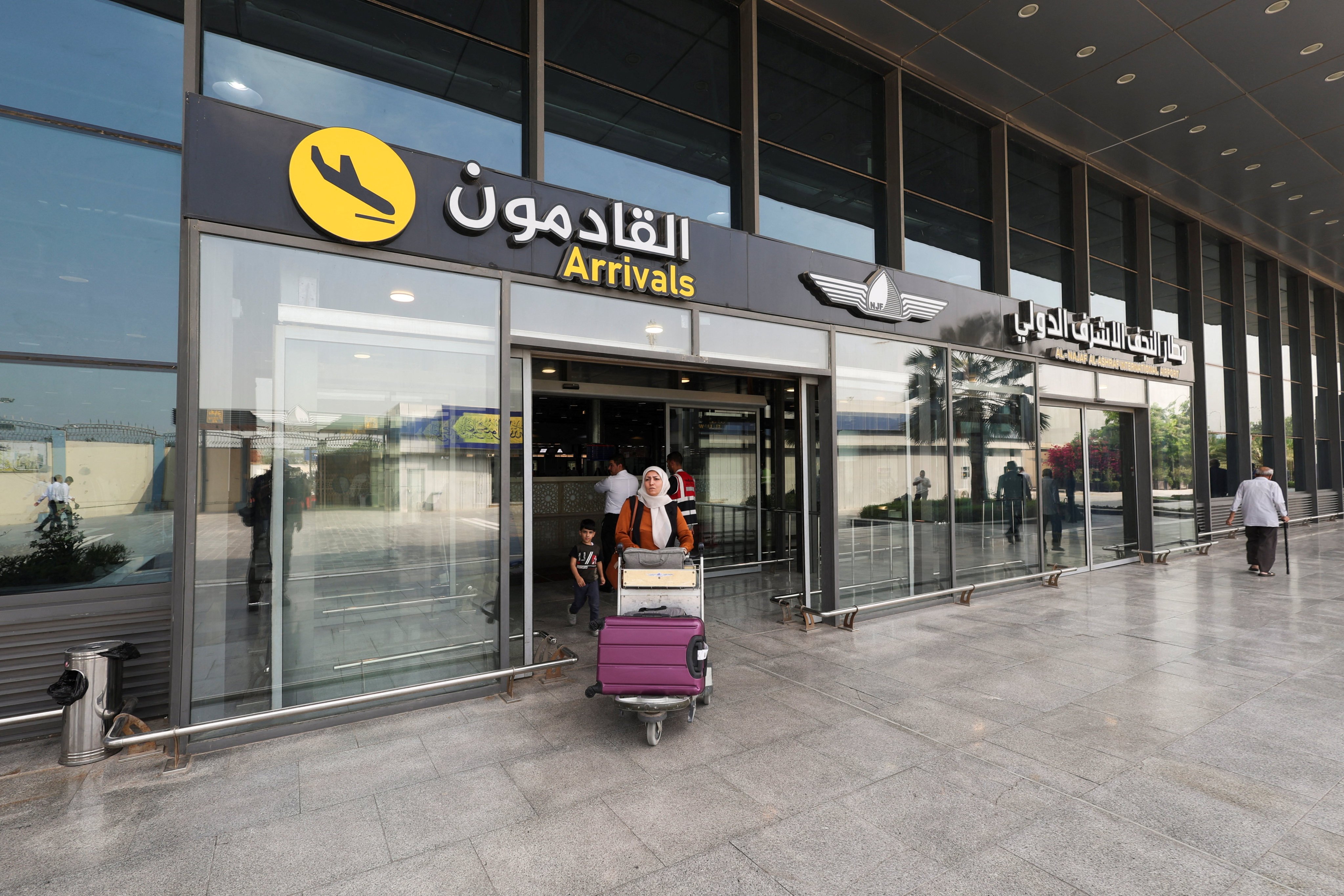 Travellers arrive at Najaf International Airport in Iraq. Photo: Reuters