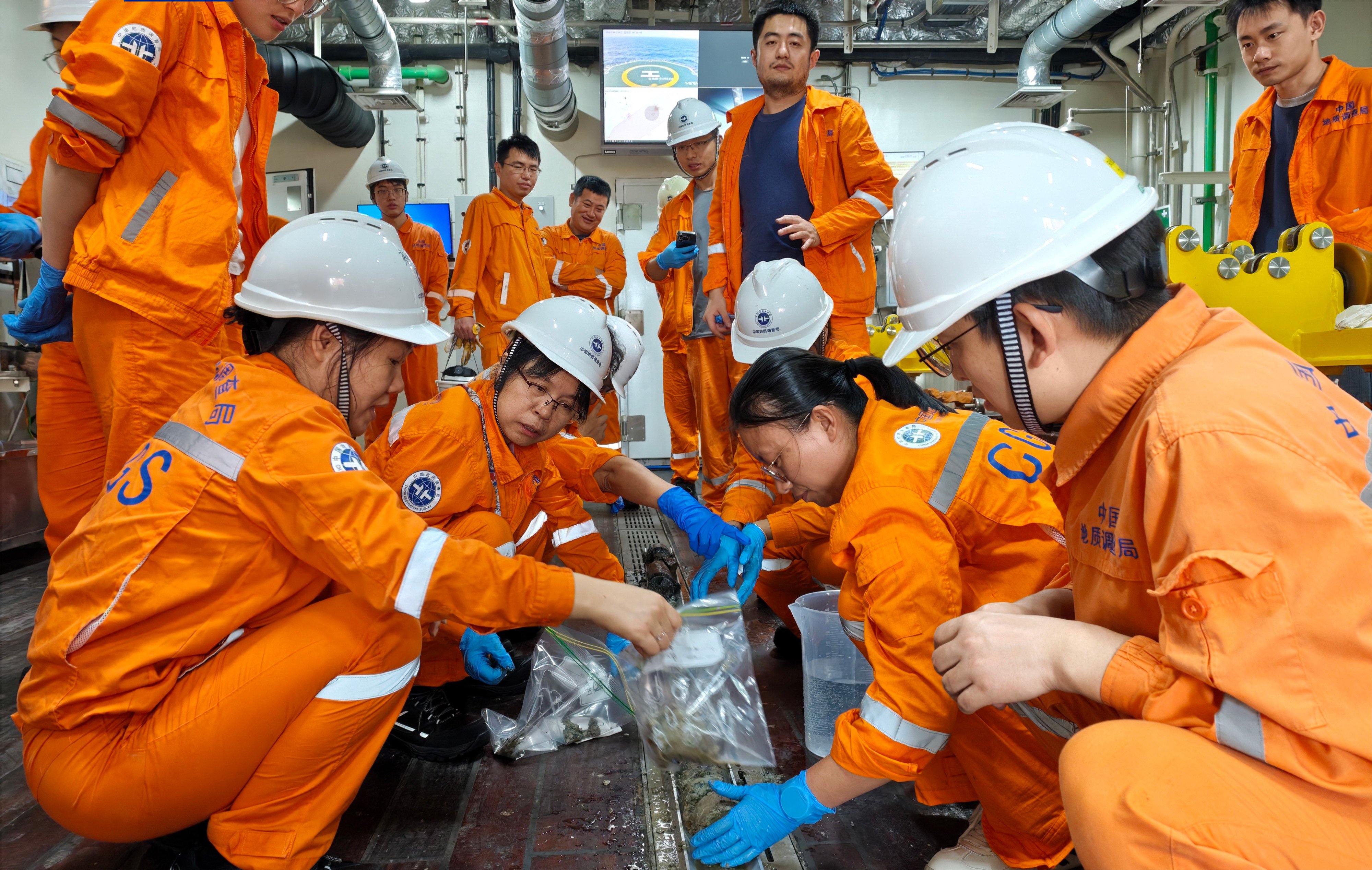 Researchers on board the Chinese ocean drilling vessel Mengxiang retrieve a deep-sea sample during a drilling operation in the South China Sea basin. Photo: CCTV