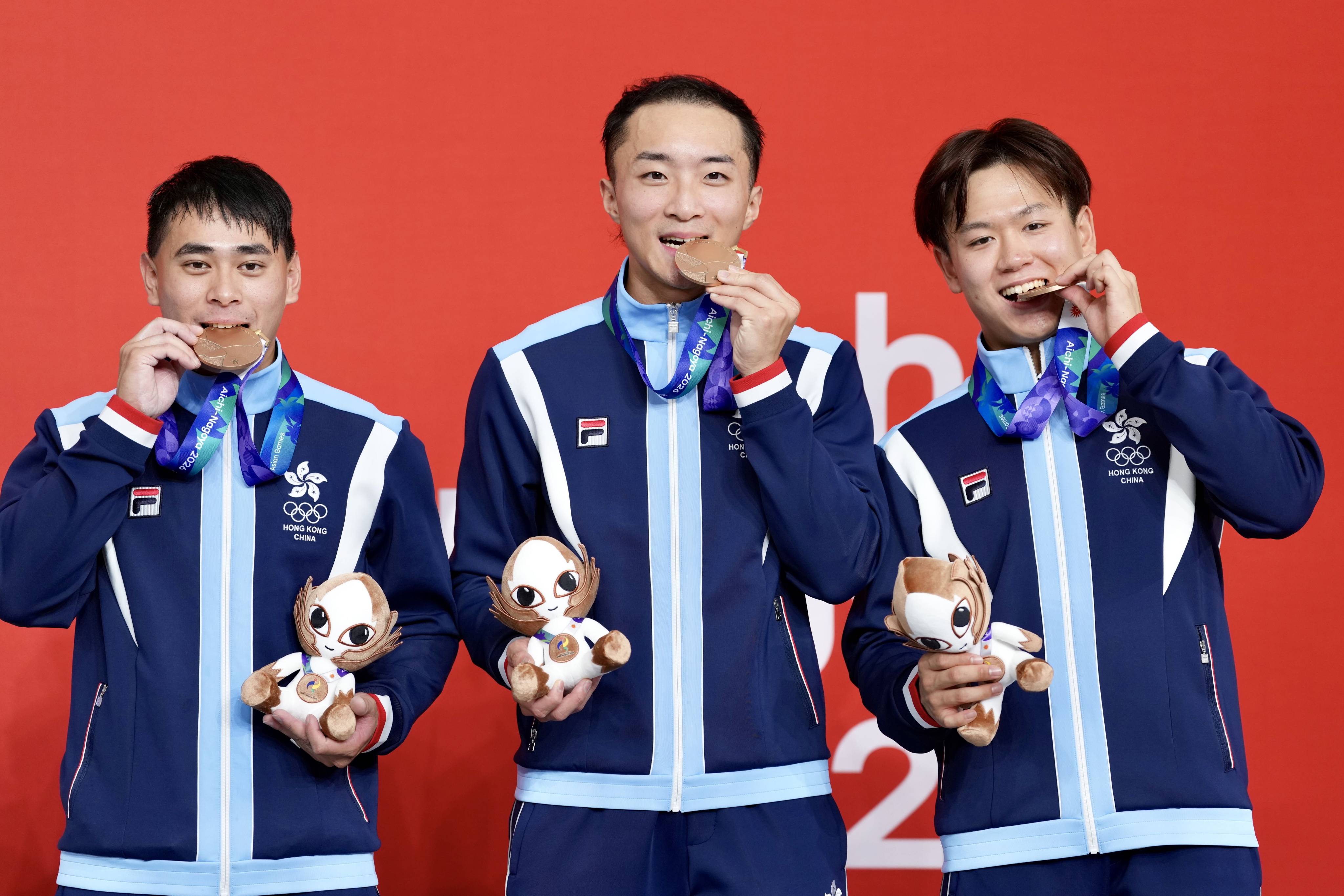 Hong Kong cyclists (from left) Yung Tsun-ho, To Cheuk-hei and Mok Tsz-chun with their men’s team sprint bronze medals at Izu Velodrome. Photo: Sam Tsang
