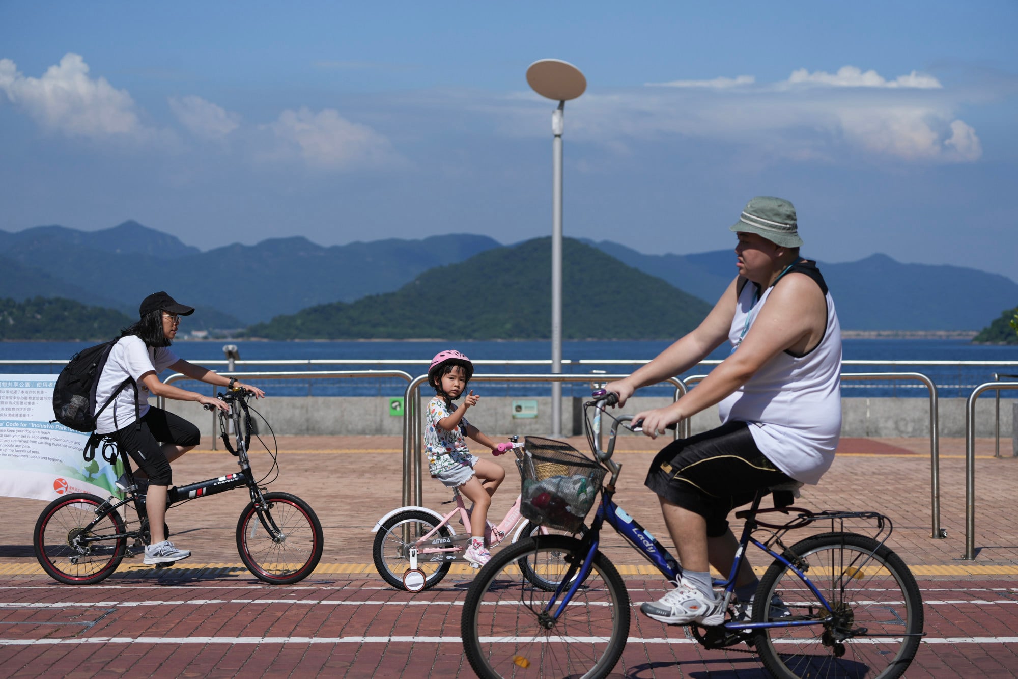 Cyclists ride along the track near the Science Park in Sha Tin. Photo: Sam Tsang Cyclists ride along the track near the Science Park in Sha Tin. Photo: Sam Tsang