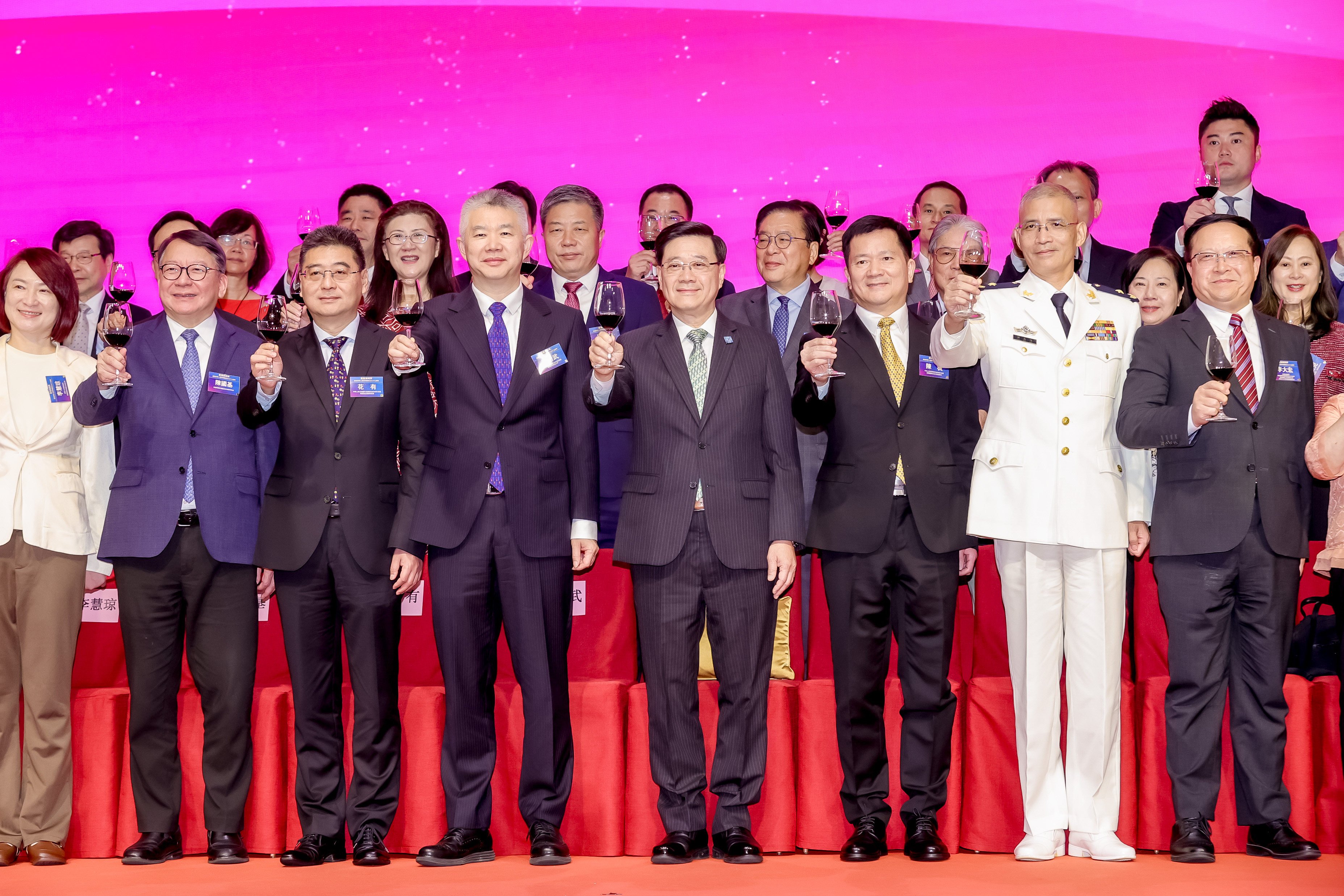 City leader John Lee (fourth from right) says the media is a transmitter of public opinion during an event celebrating the 77th anniversary of the founding of the People’s Republic of China. Photo: Handout