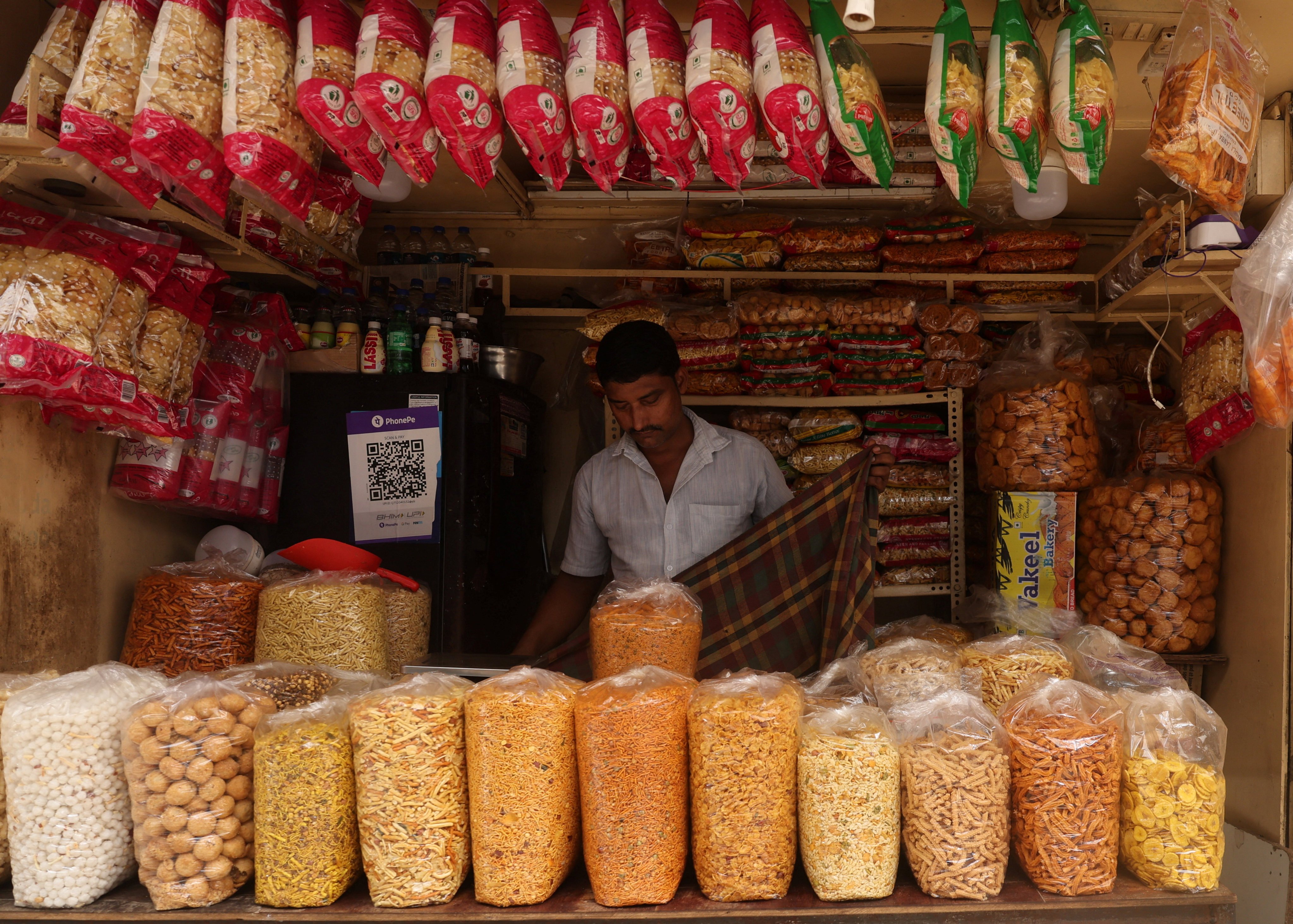 Traditional and prepacked snacks are sold at a shop in Mumbai on September 20. Photo: Reuters