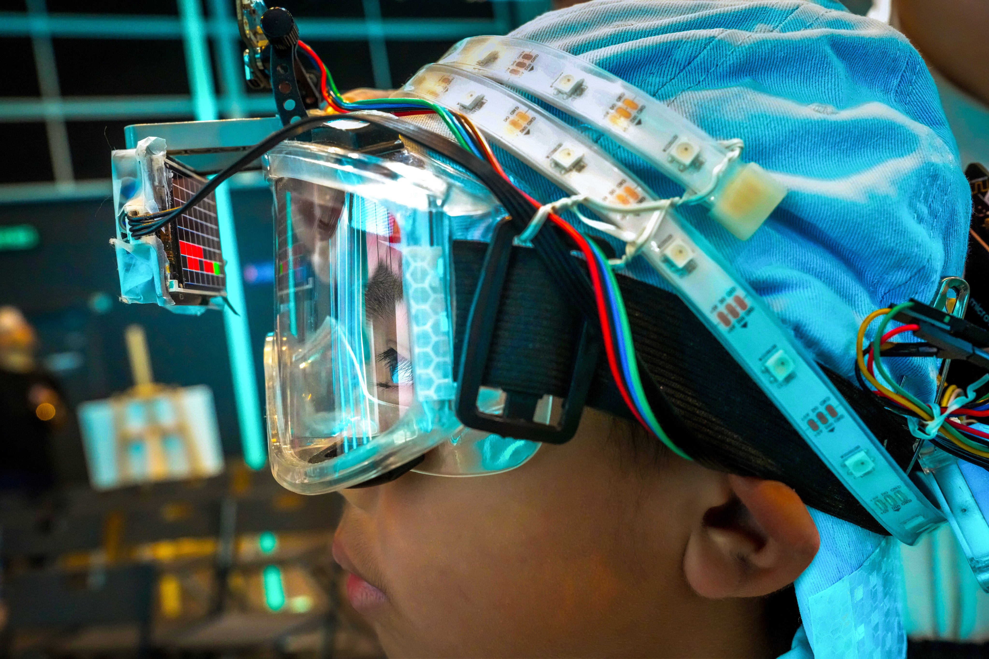 A student from a Hong Kong school demonstrates his team’s “smart disaster-prevention glasses”, an AI-powered system that maps escape routes during a fire, after the project won gold at the 8th Greater Bay Area Digital STEAM competition, on August 21. Hong Kong’s chief executive has announced that the city will develop an integrated management system that links and consolidates relevant big data of departments with city governance matters.
Photo: Dickson Lee