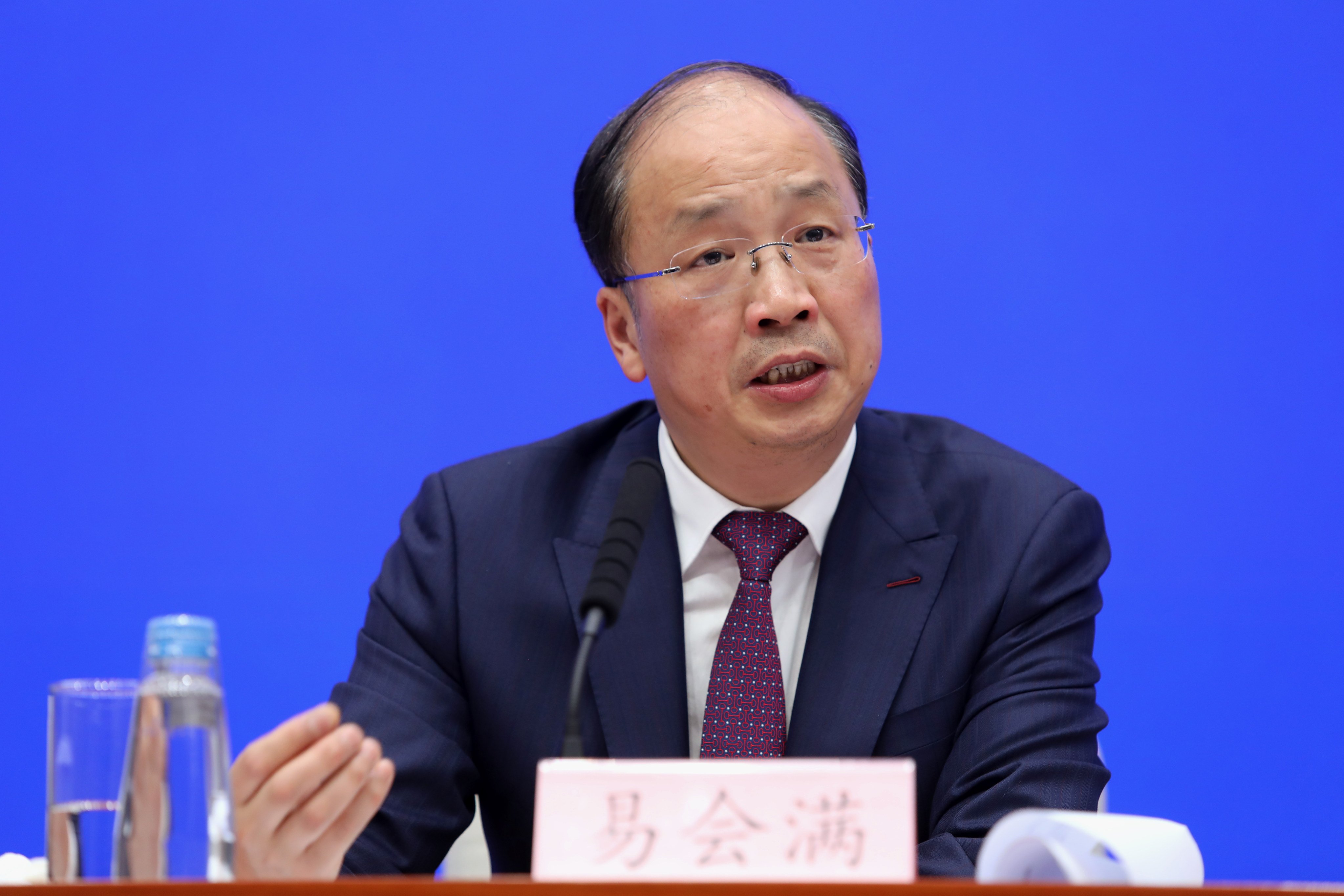 Yi Huiman, then chairman of the China Securities Regulatory Commission, speaks at a press conference in Beijing on February 27, 2019. Photo: Simon Song