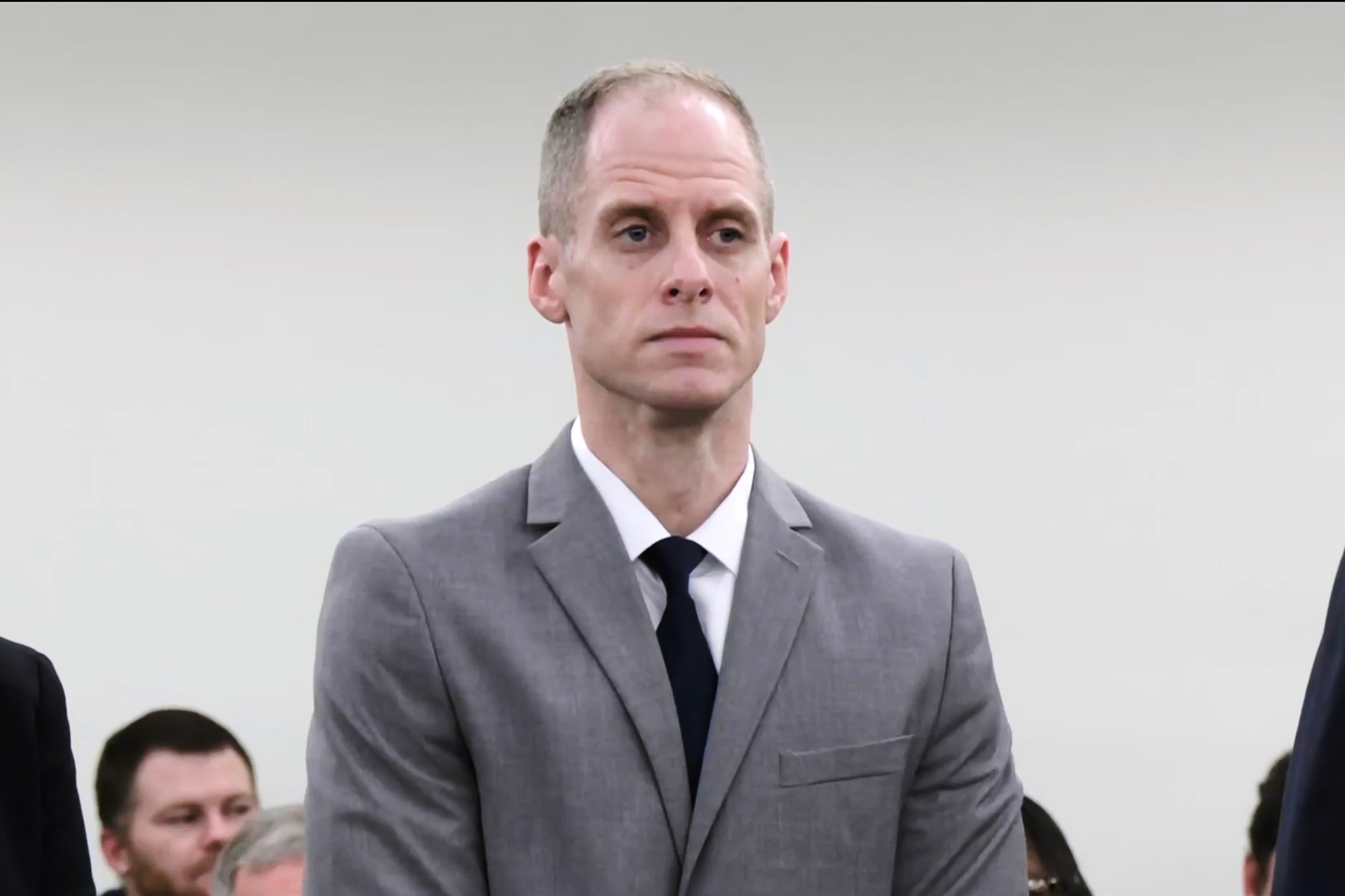 Caleb Flynn listens to the judge reading out the jury’s verdict. Photo: AP