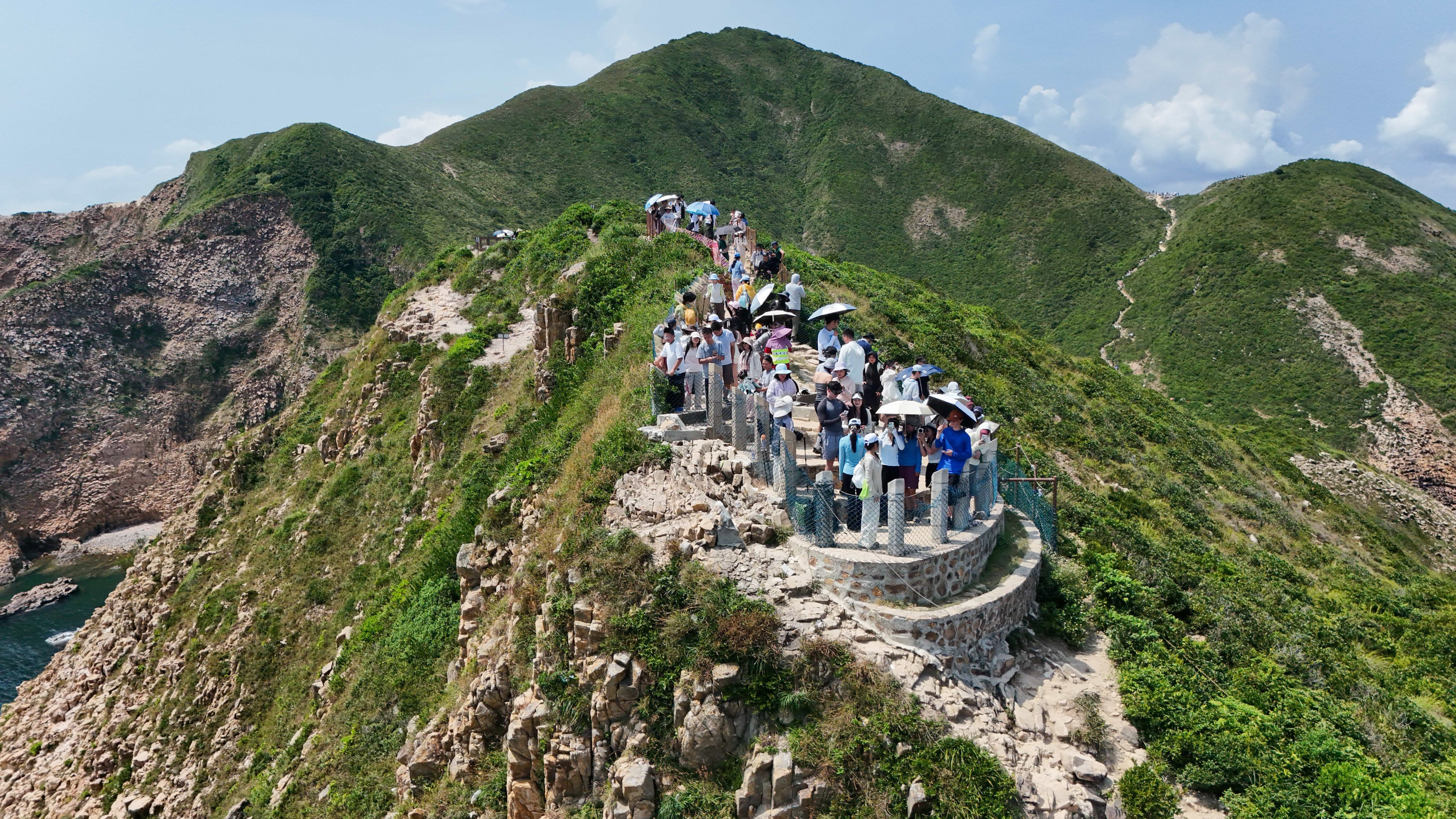 Tourists visit Po Pin Chau during first day of the National Day 'golden week' holiday. Photo: Edmond So