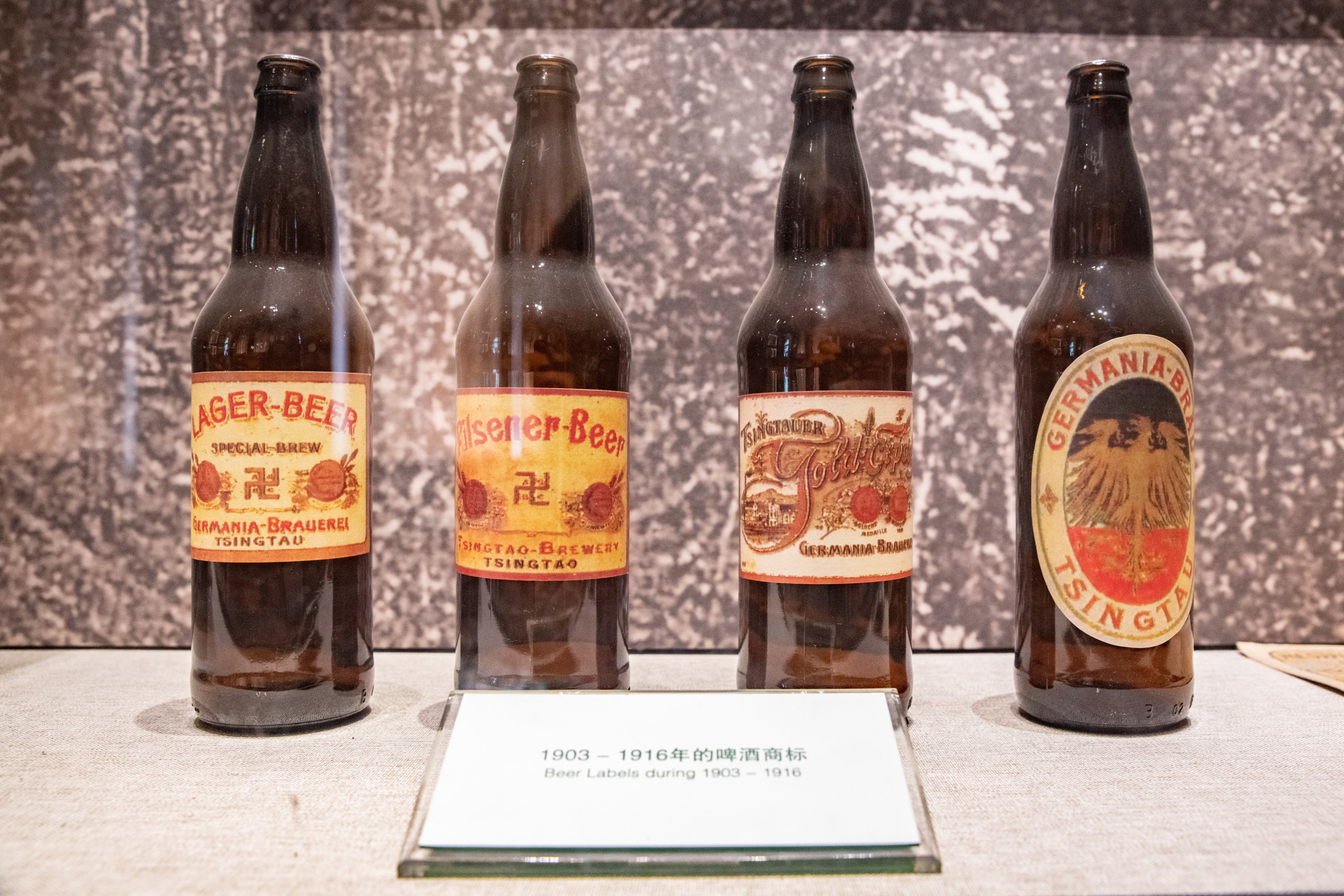 Bottles of beer dating from 1903 to 1916 on show at the Tsingtao Brewery Museum in Qingdao, in China’s Shandong Province. Photo: Picture Alliance via Getty Images