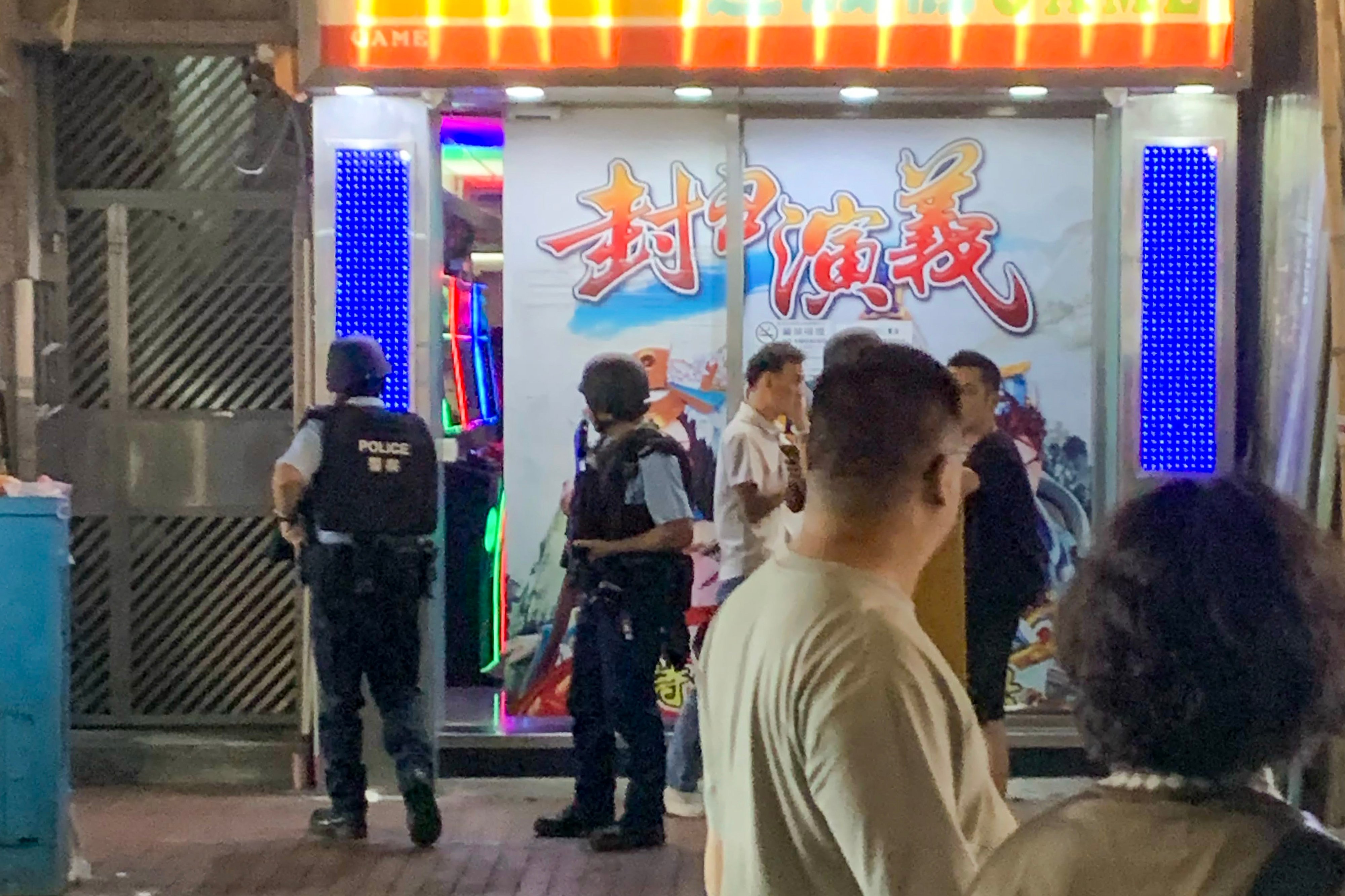 Police outside the bar at Temple Street, where the 36-year-old Australian was arrested after he was found carrying an air gun. Photo: Threads