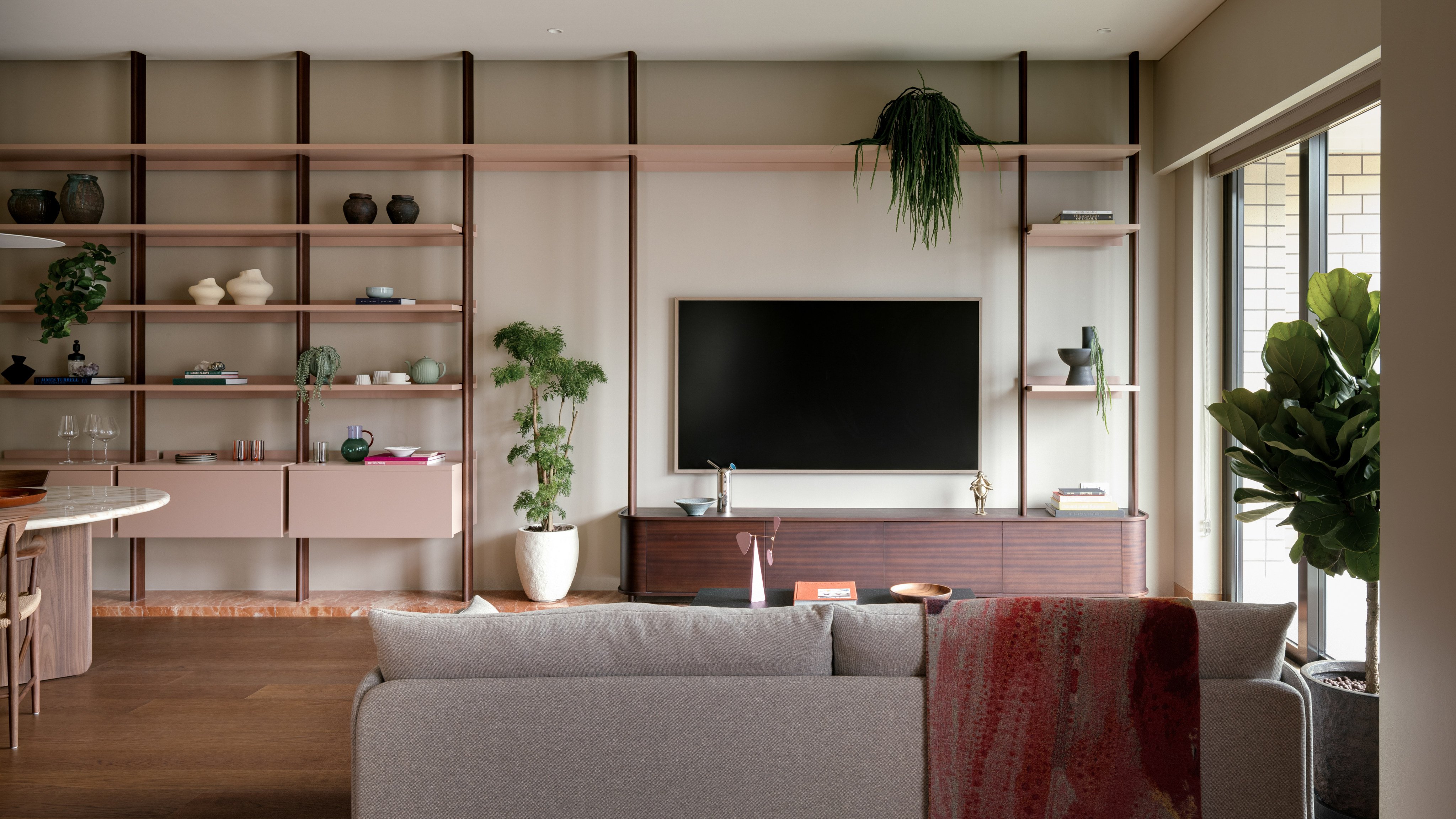The living area of the Mid-Levels flat, which was transformed into a functional space with clean lines. Photo: Harold de Puymorin. Styling: Esther van Wijck