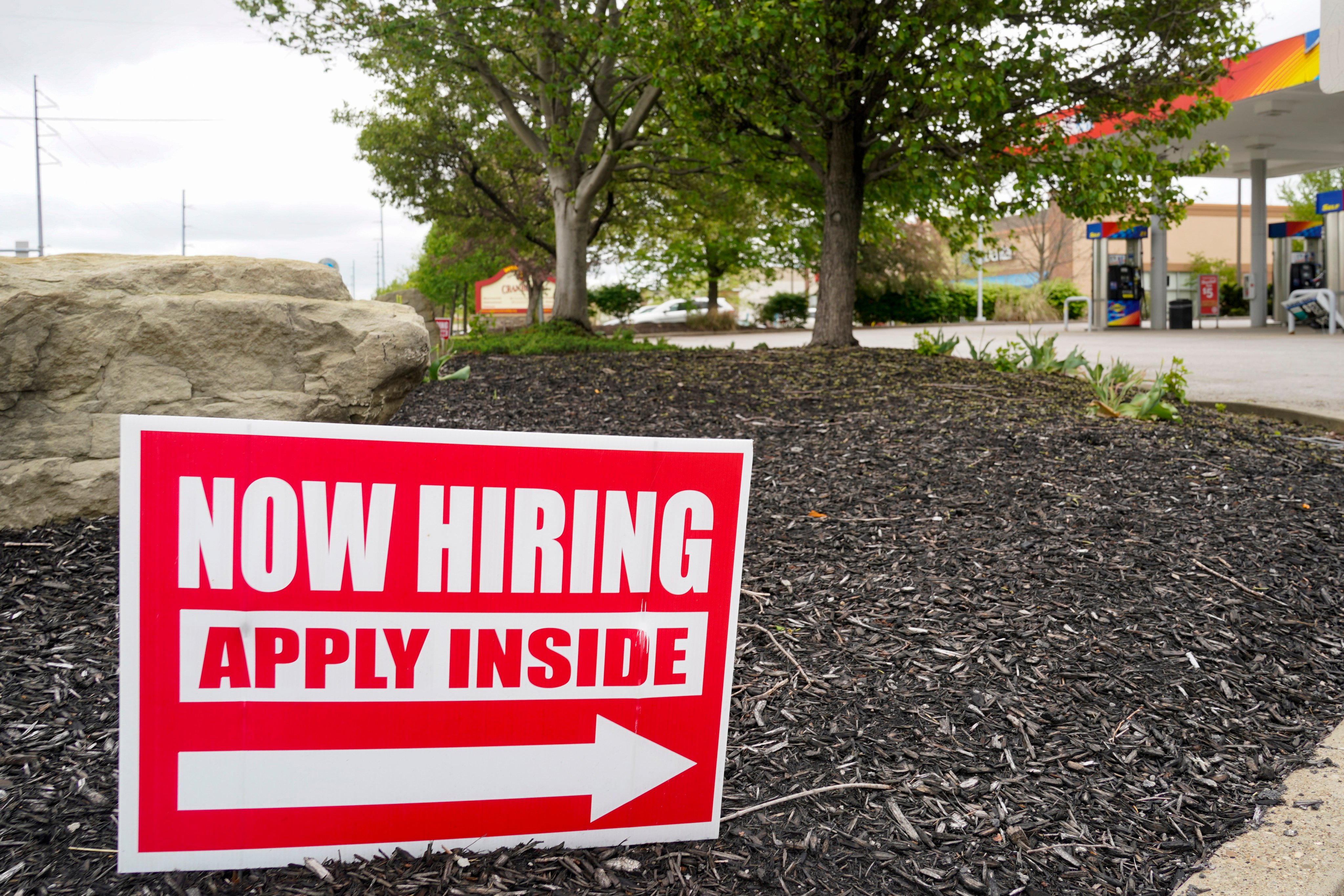 Hiring signs are posted outside a gas station in Cranberry Township, Butler County, Pennsylvania in the US. Photo: AP