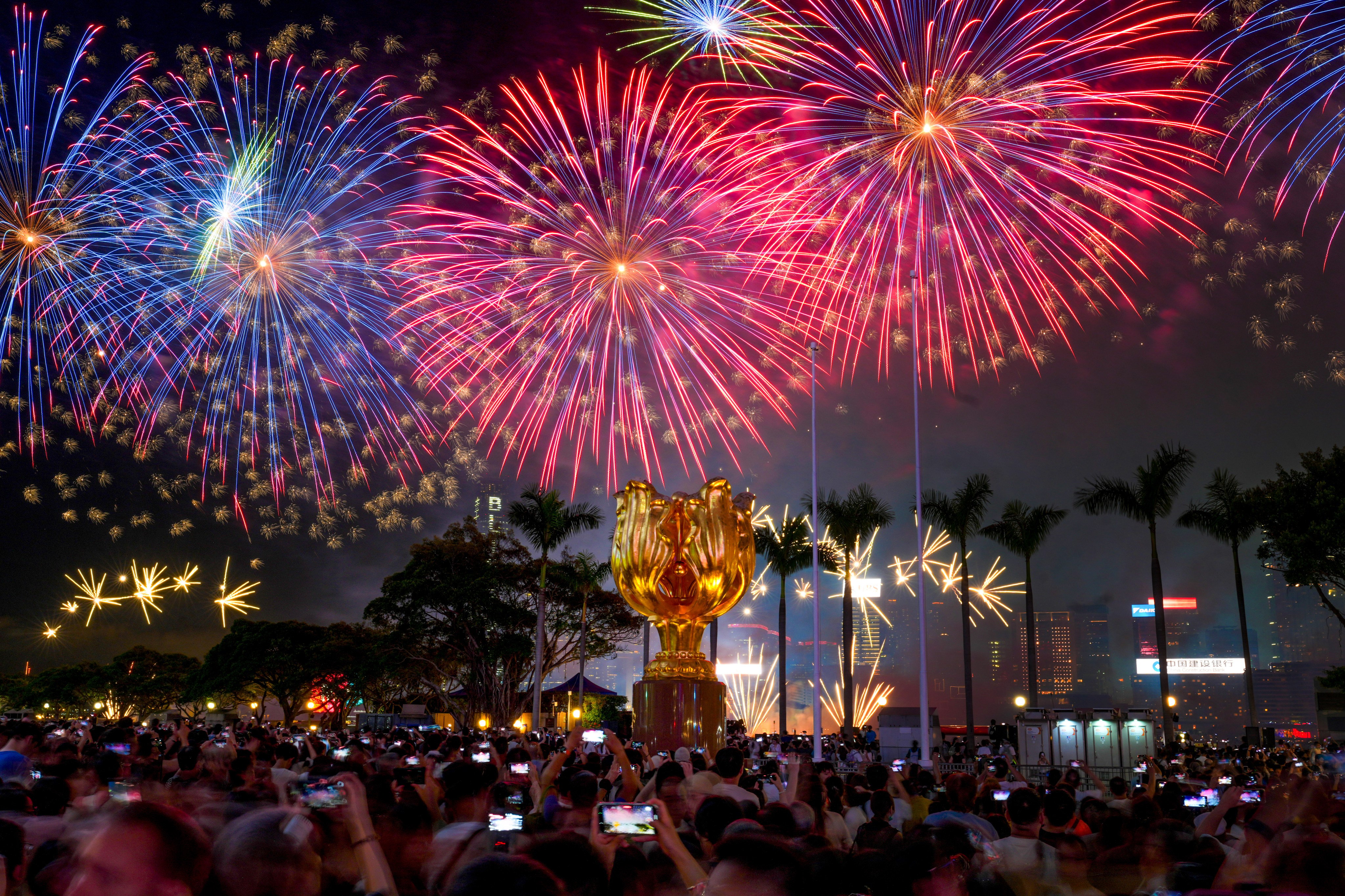 The view from Golden Bauhinia Square in Wan Chai as fireworks light up the night sky over Victoria Harbour. Photo: Dickson Lee