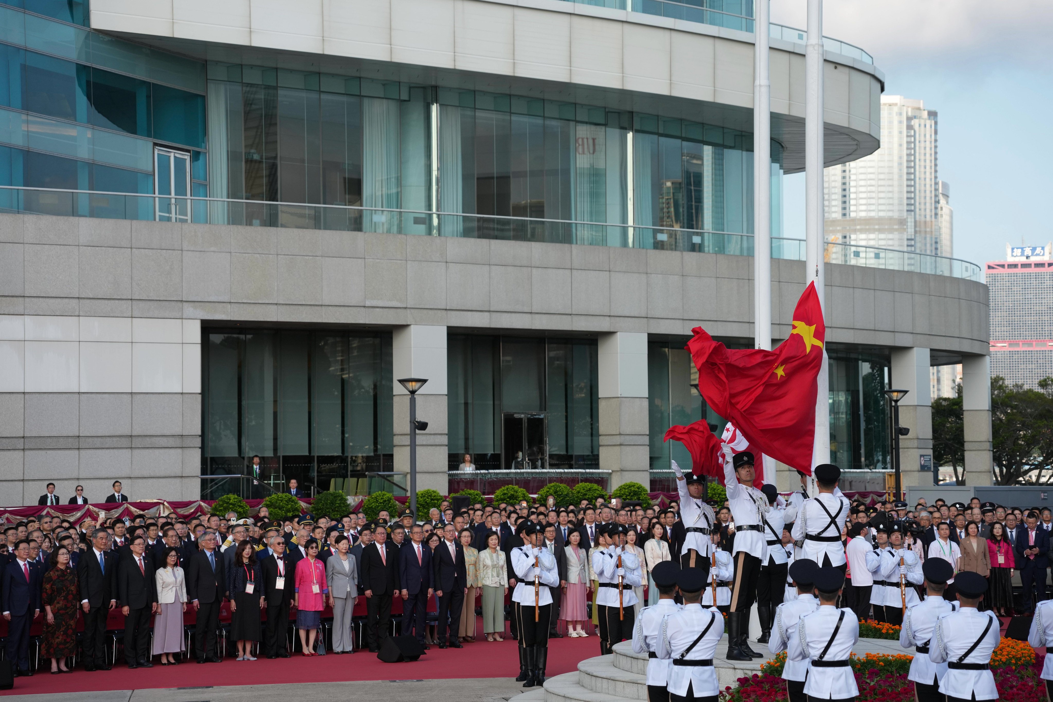 Hong Kong officials and other dignataries attend a flag-raising ceremony to celebrate the 77th anniversary of the founding of the People’s Republic of China, at Golden Bauhinia Square in Wan Chai, on October 1. Photo: Karma Lo