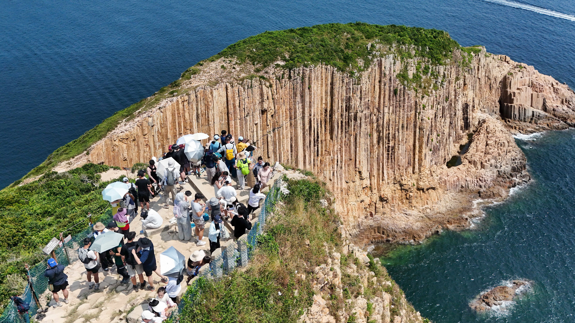 Mainland tourists visit Po Pin Chau, located in the Hong Kong UNESCO Global Geopark during National Day holiday. 01OCT26 SCMP/ Edmond So
** for video thumbnail **