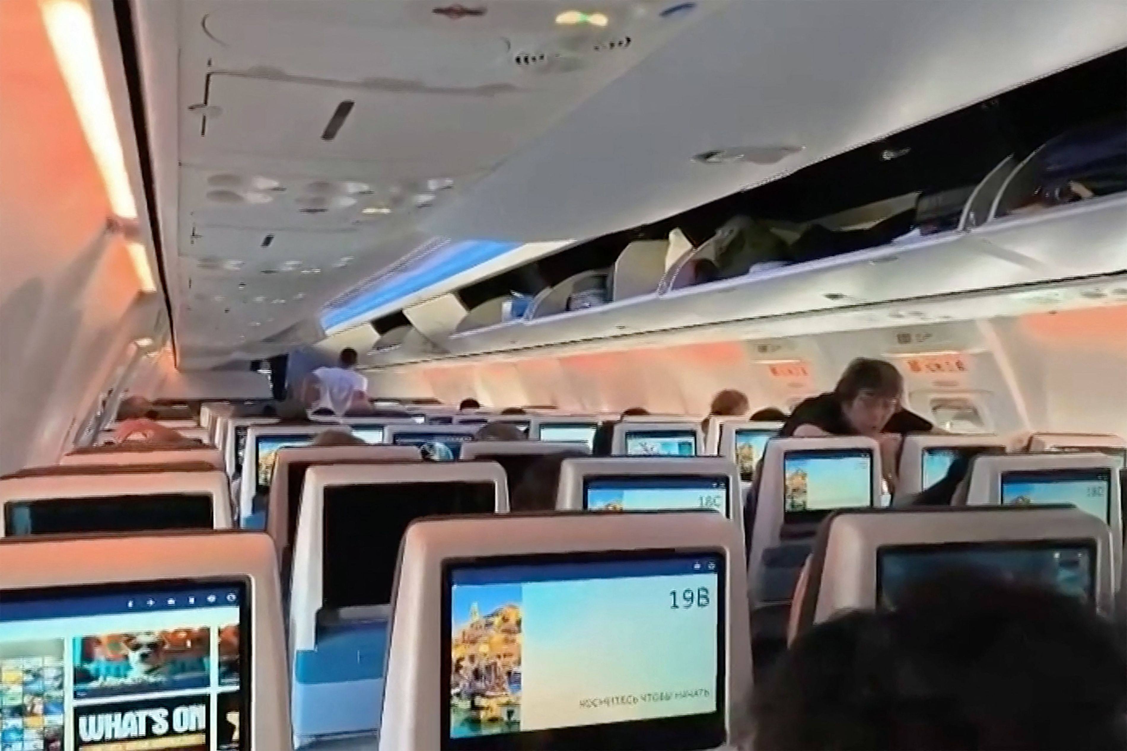 Passengers inside the rerouted flydubai flight FZ 1073, ahead of its departure to Tel Aviv from Saudi Arabia’s Tabuk airport. Photo: AFP