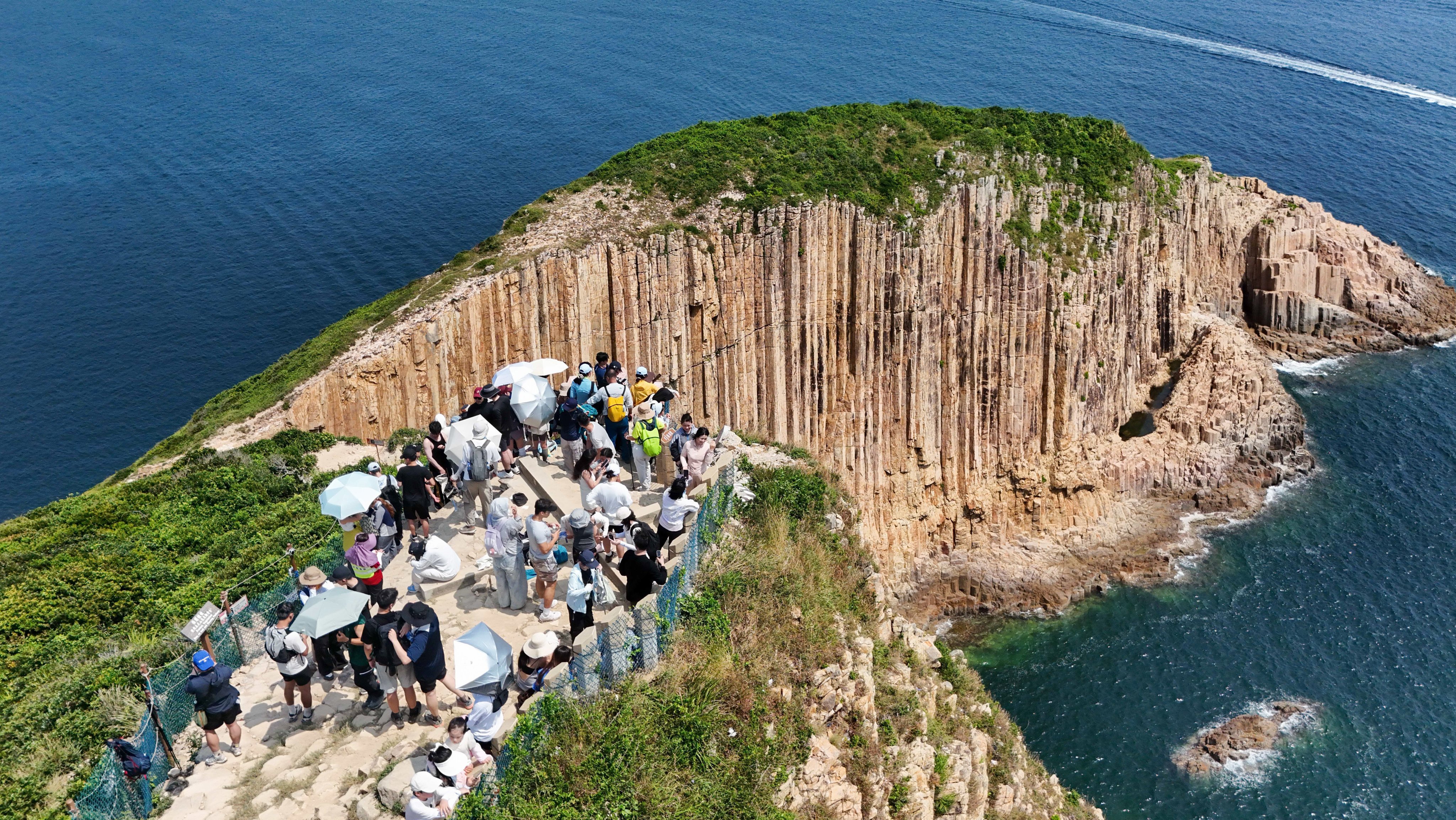 Tourists visit Po Pin Chau during first day of the National Day 'golden week' holiday. Photo: Edmond So