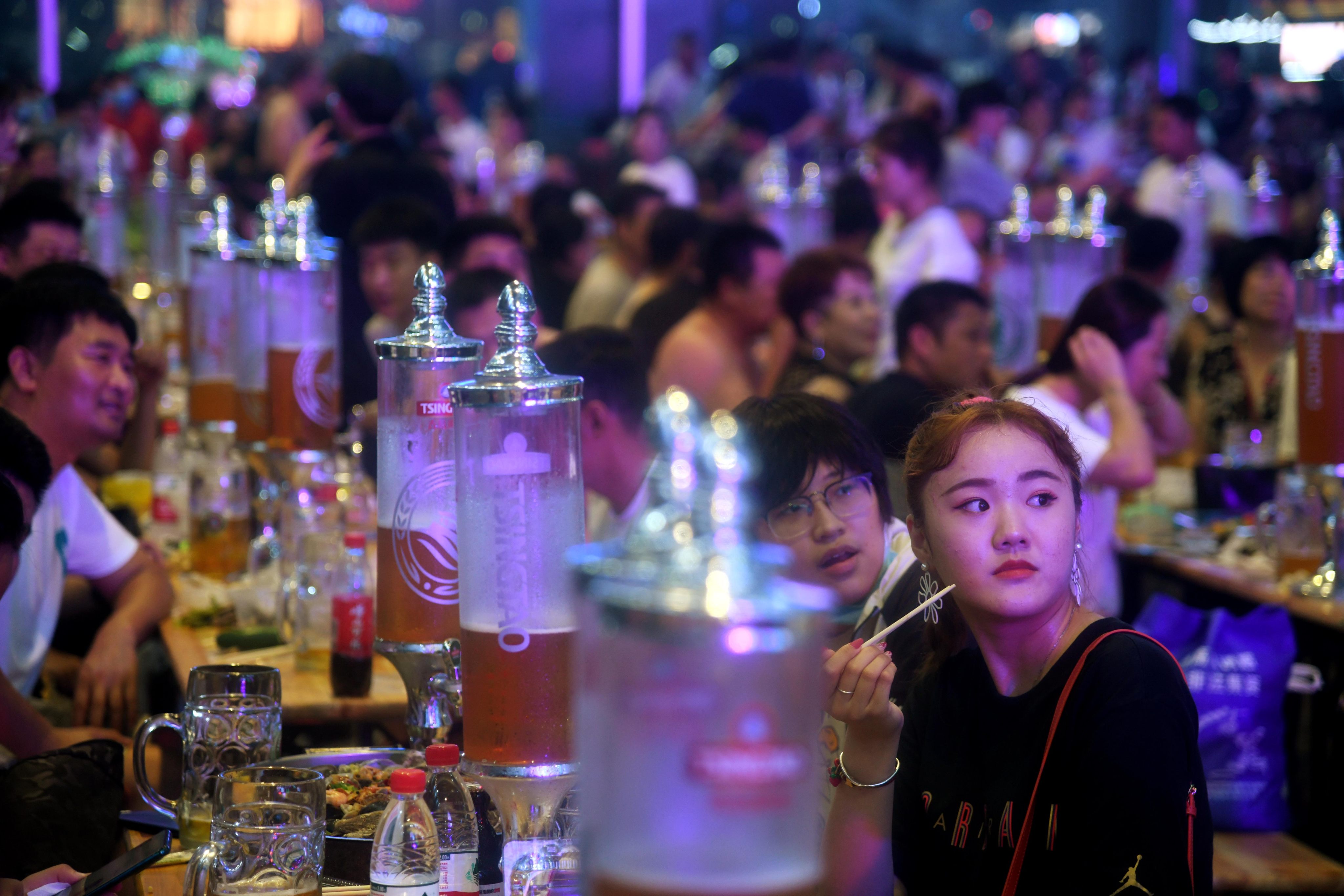 Visitors watch a performance during the Qingdao International Beer Festival in China’s Shandong province in 2020. The story of beer in Shandong is tied up with a difficult chapter of Chinese history. Photo: Xinhua