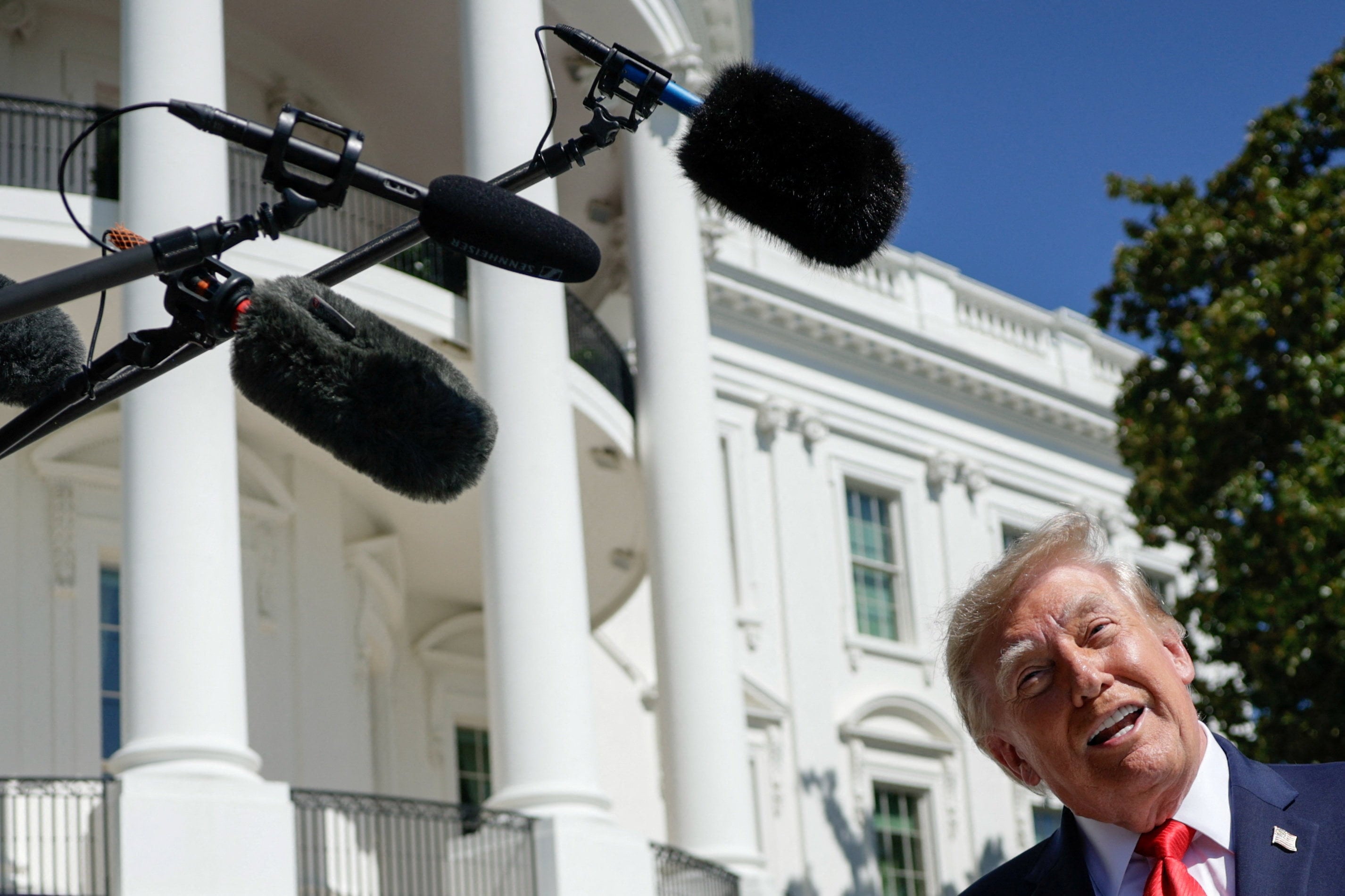 US President Donald Trump speaks to reporters at the White House on Wednesday. Photo: Reuters