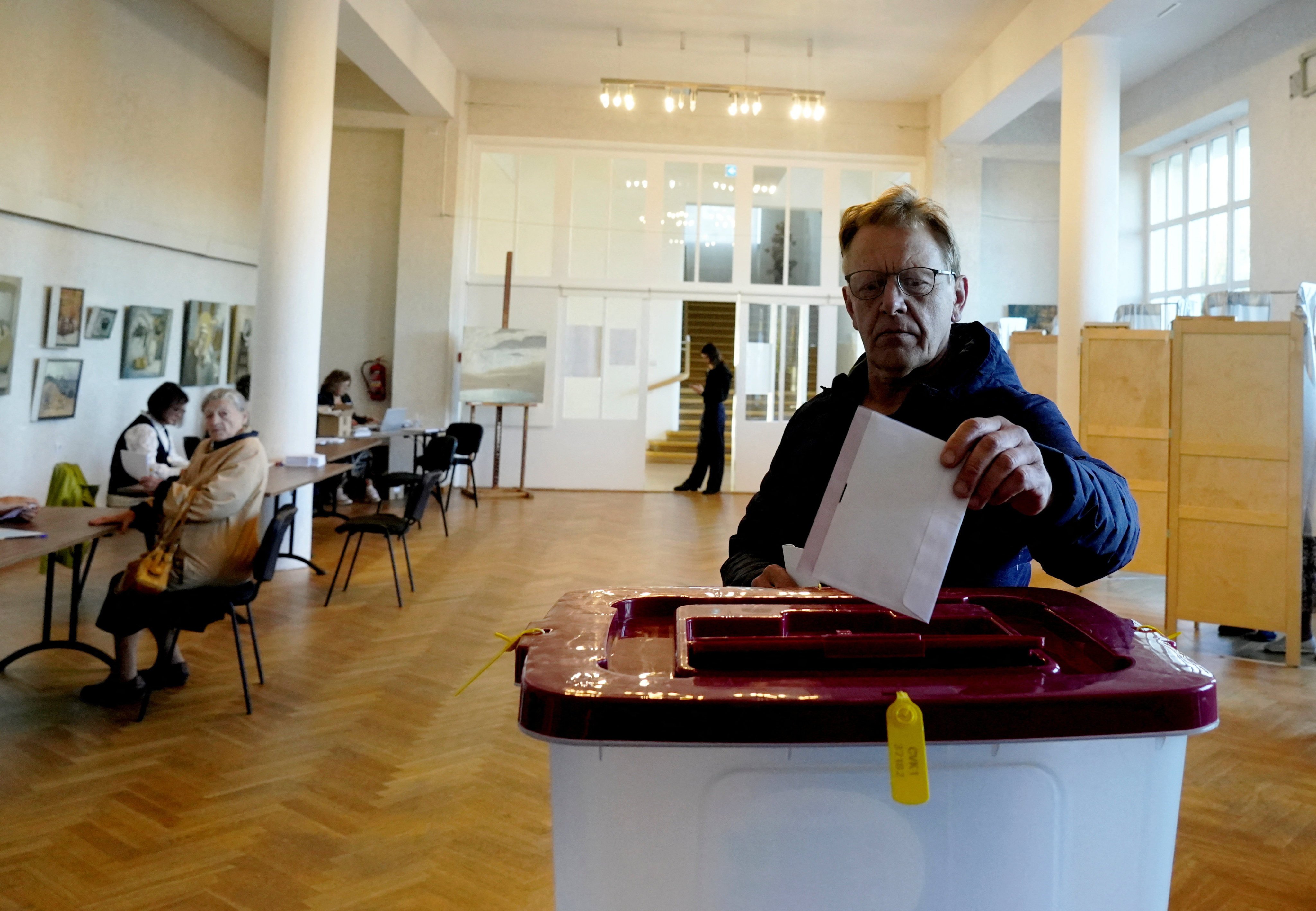 A man votes during the general election in Saulkrasti, Latvia, on Saturday. Photo: Reuters