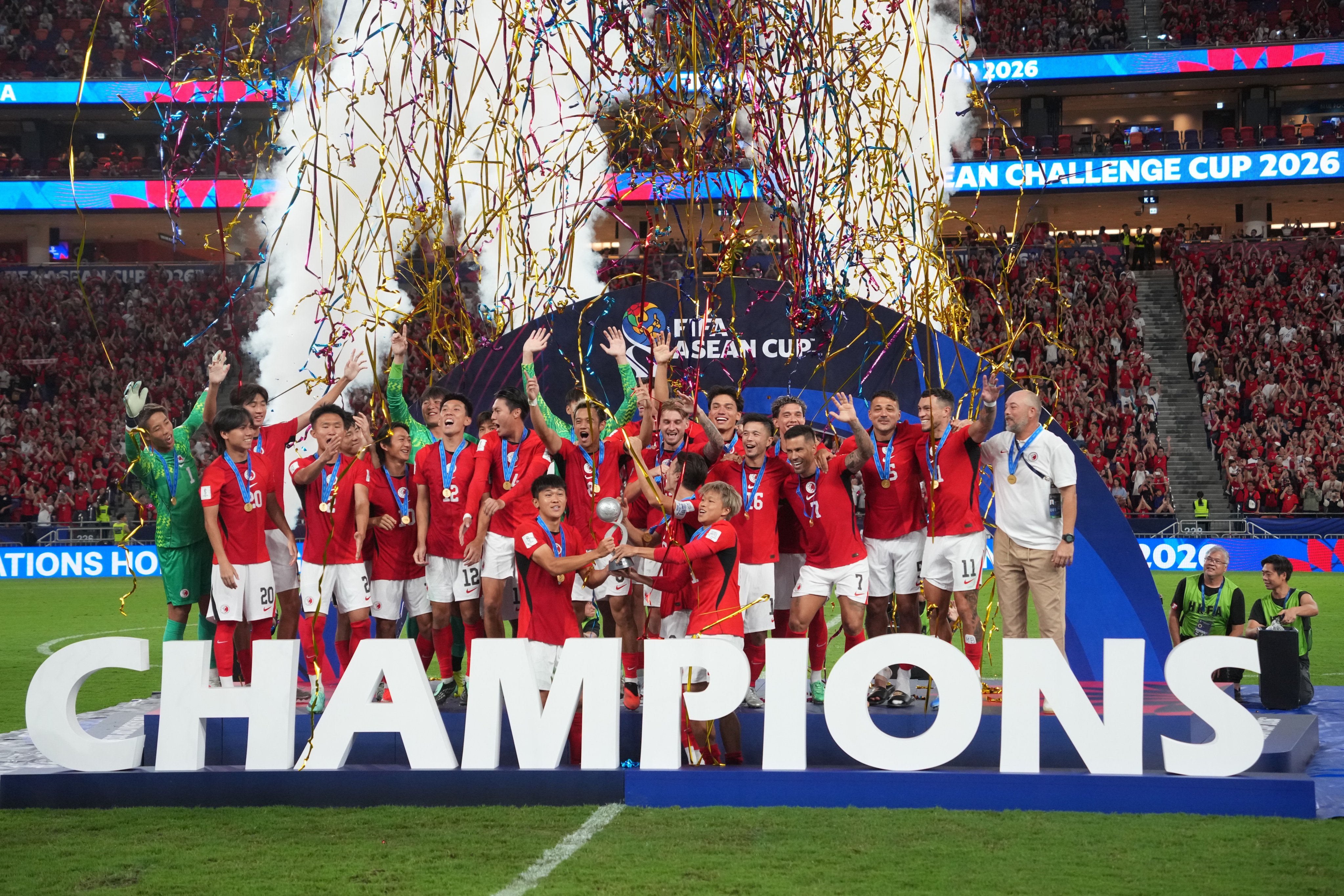 Hong Kong celebrate after being crowned inaugural Fifa Asean Challenge Cup champions at Kai Tak Stadium on Saturday. Photo: Kit Lai